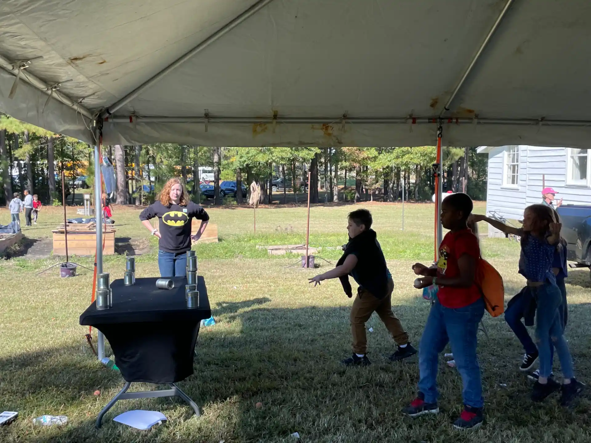 a group of kids playing in a tent