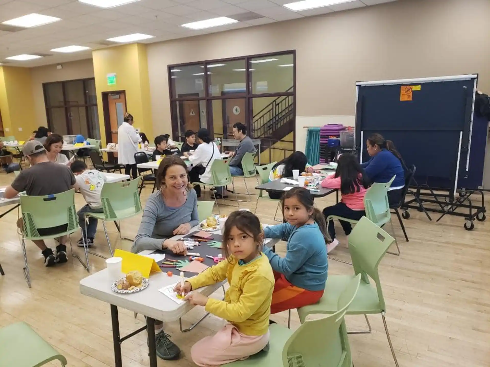 a group of people sitting at tables