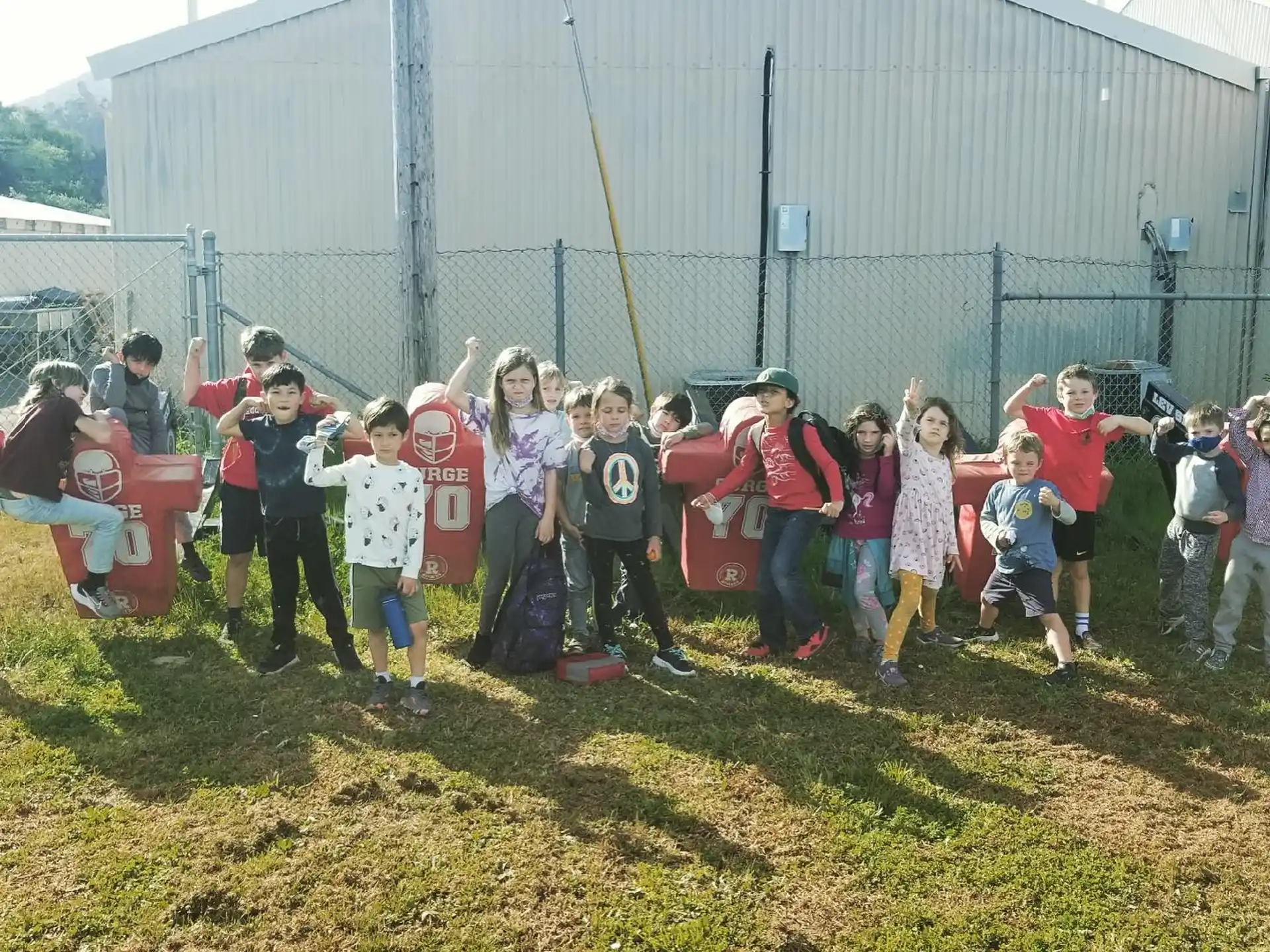 a group of children posing for a photo