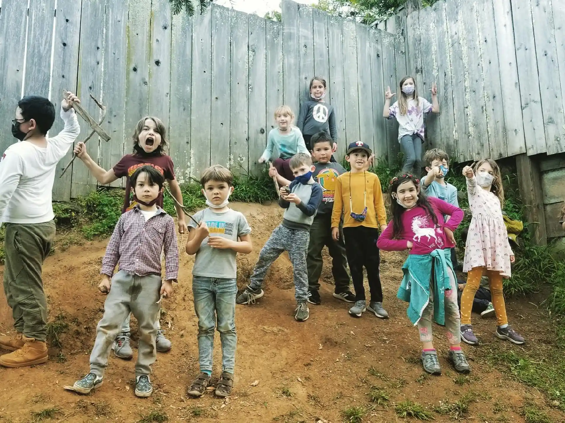 a group of children posing for a photo