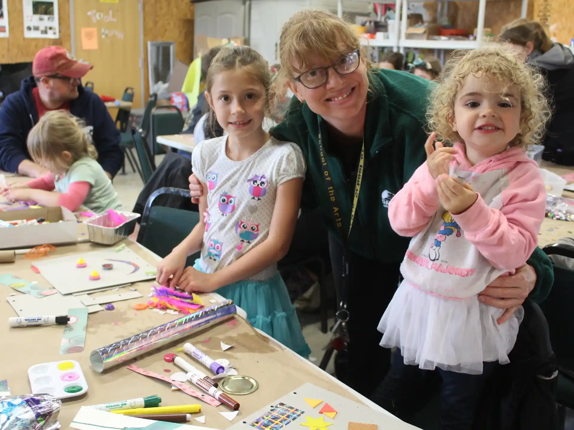 a person and two girls