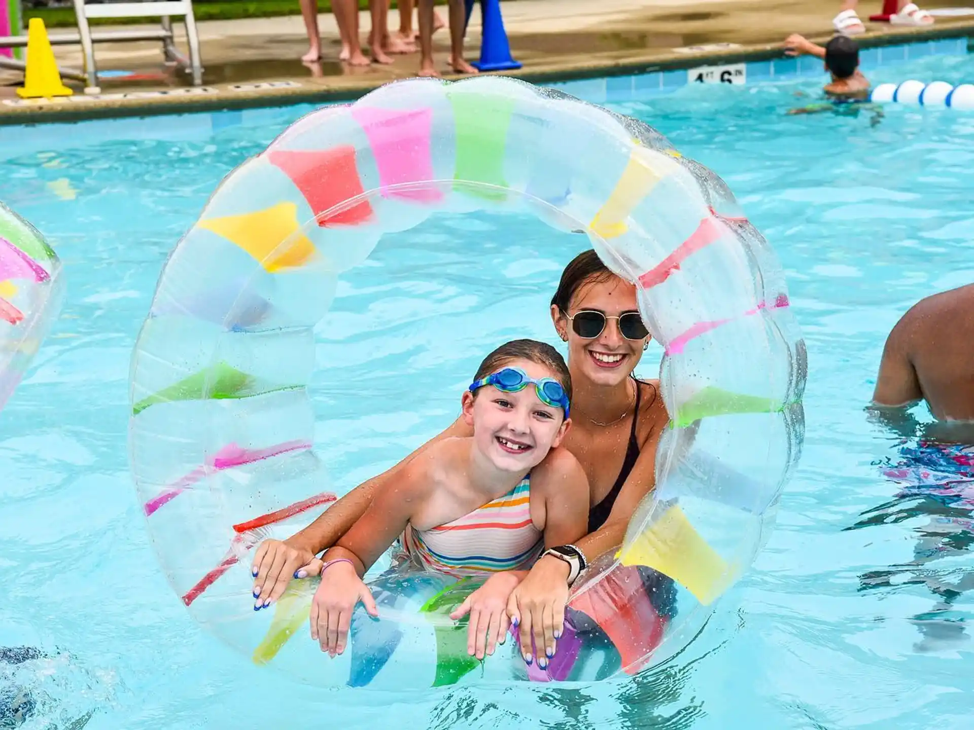 a couple of women in a pool