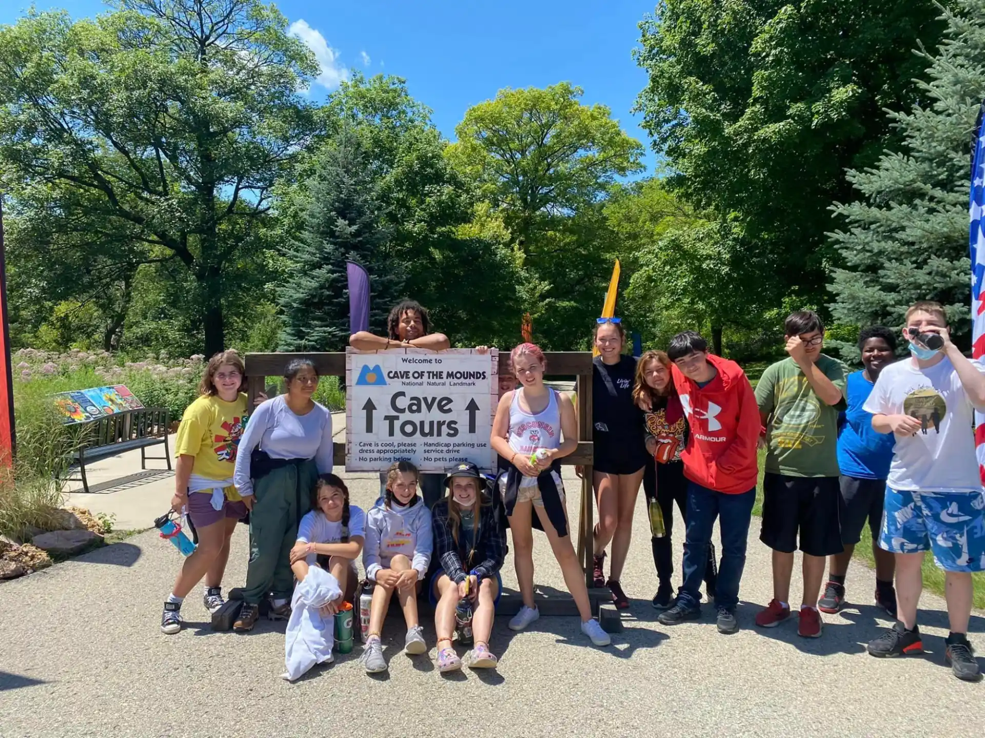 a group of people holding a sign