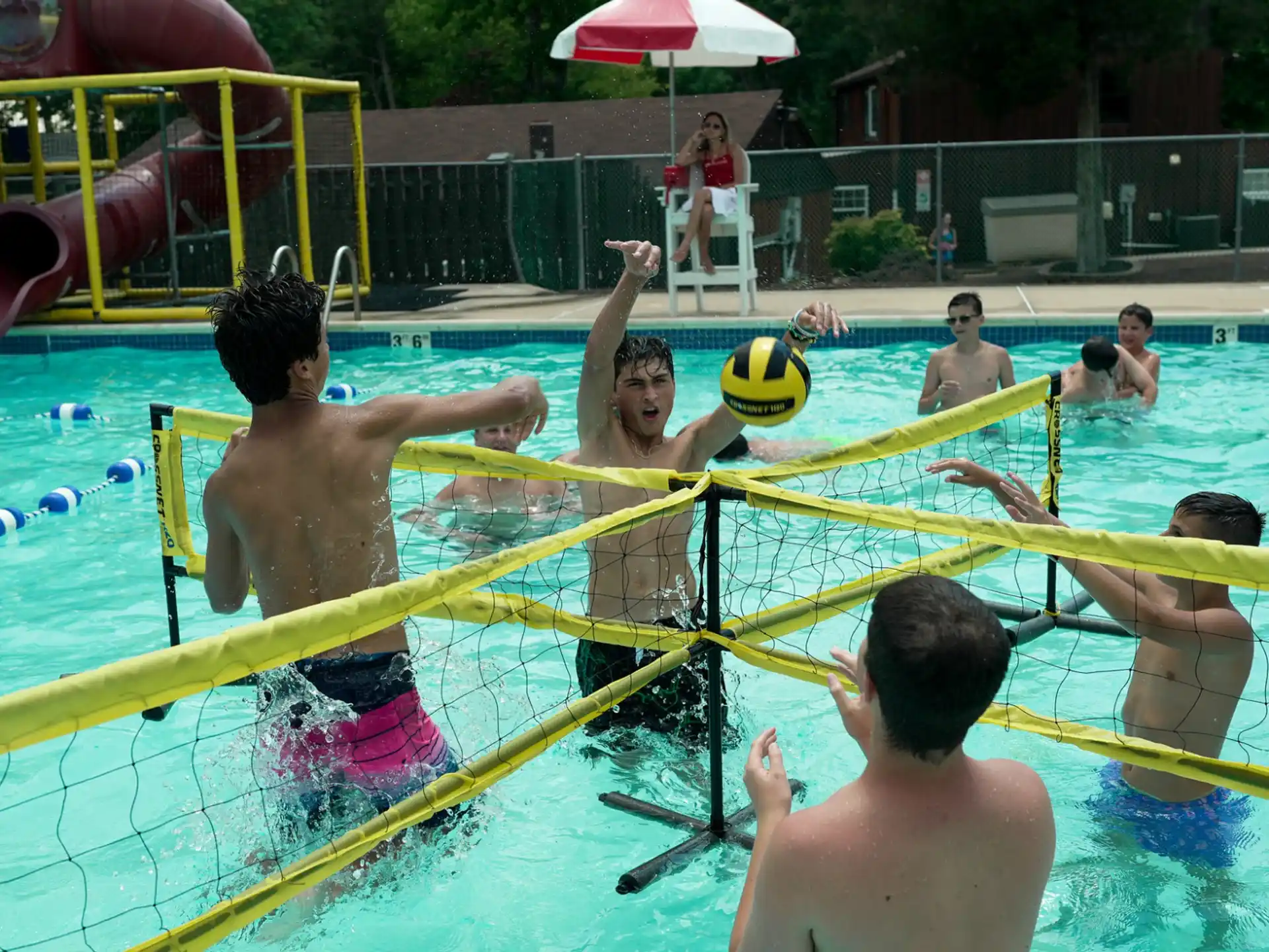 a group of people in a pool