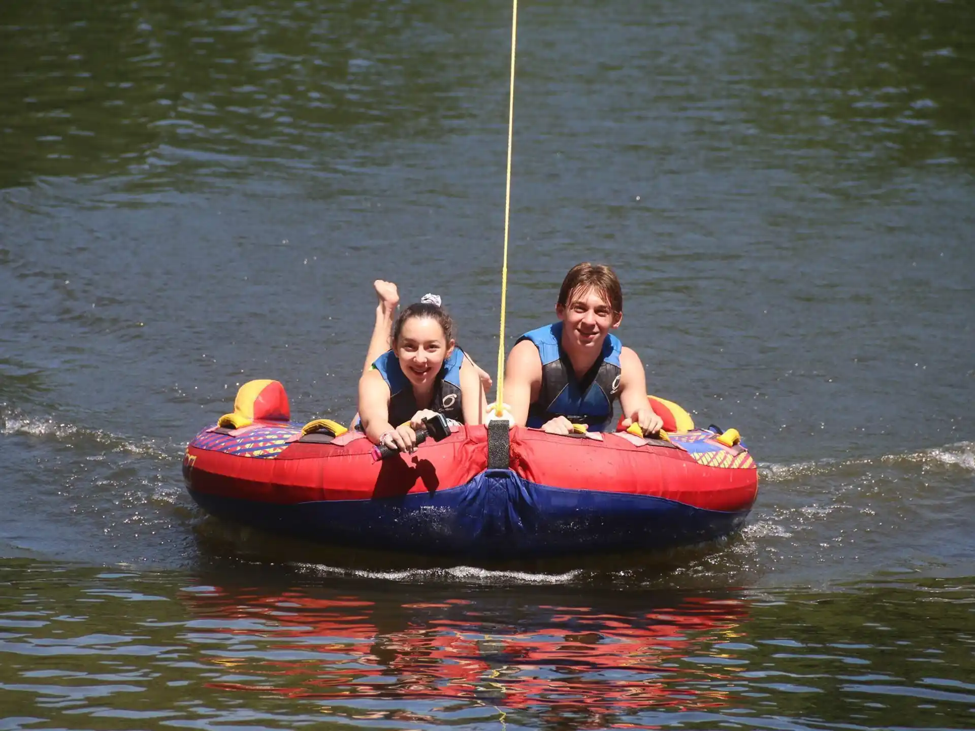 a couple of people in a canoe