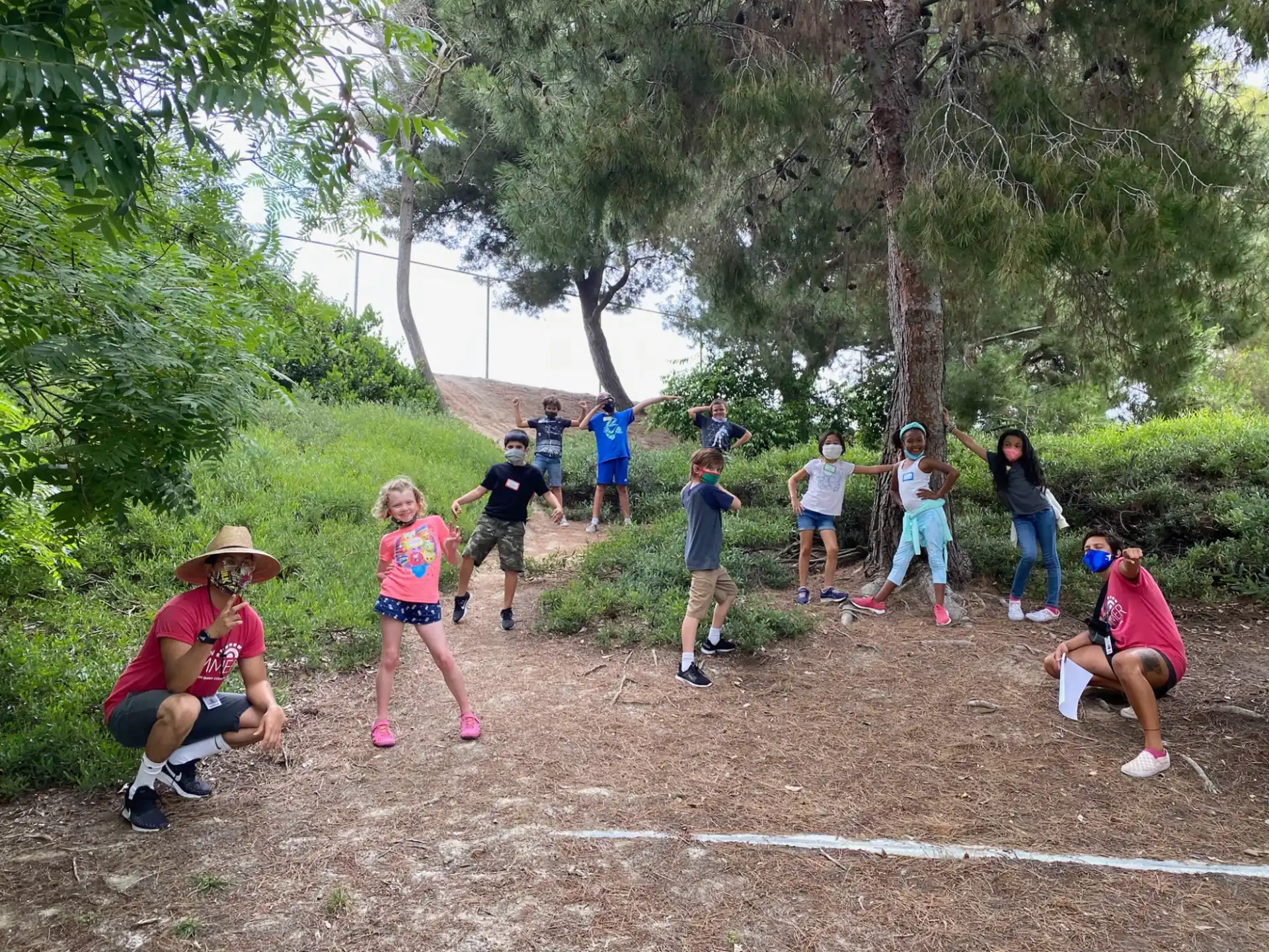 a group of people running on a trail