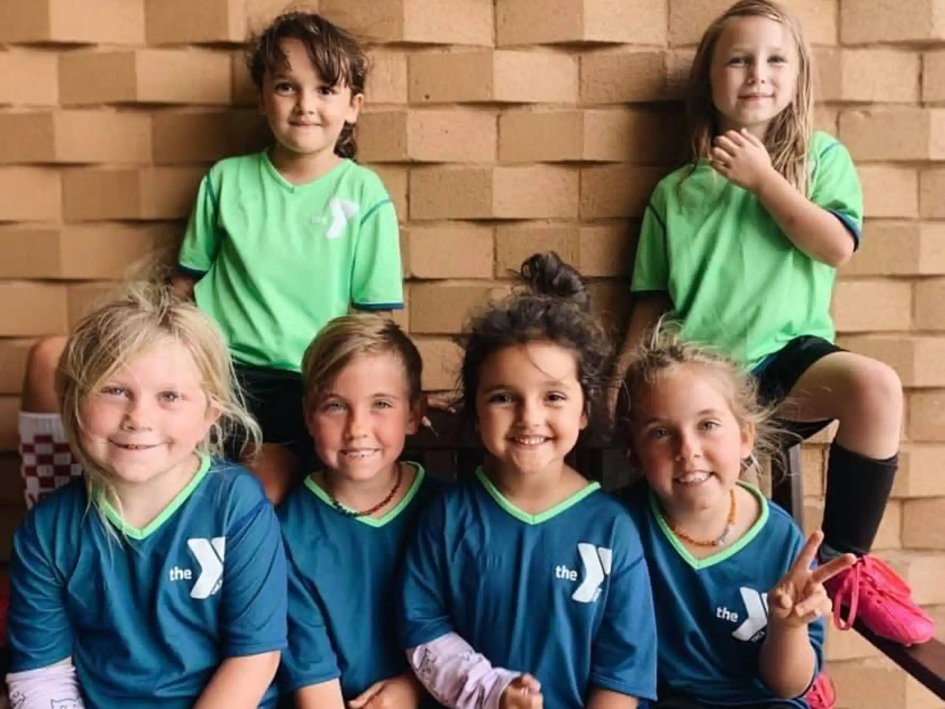 a group of children posing for a photo