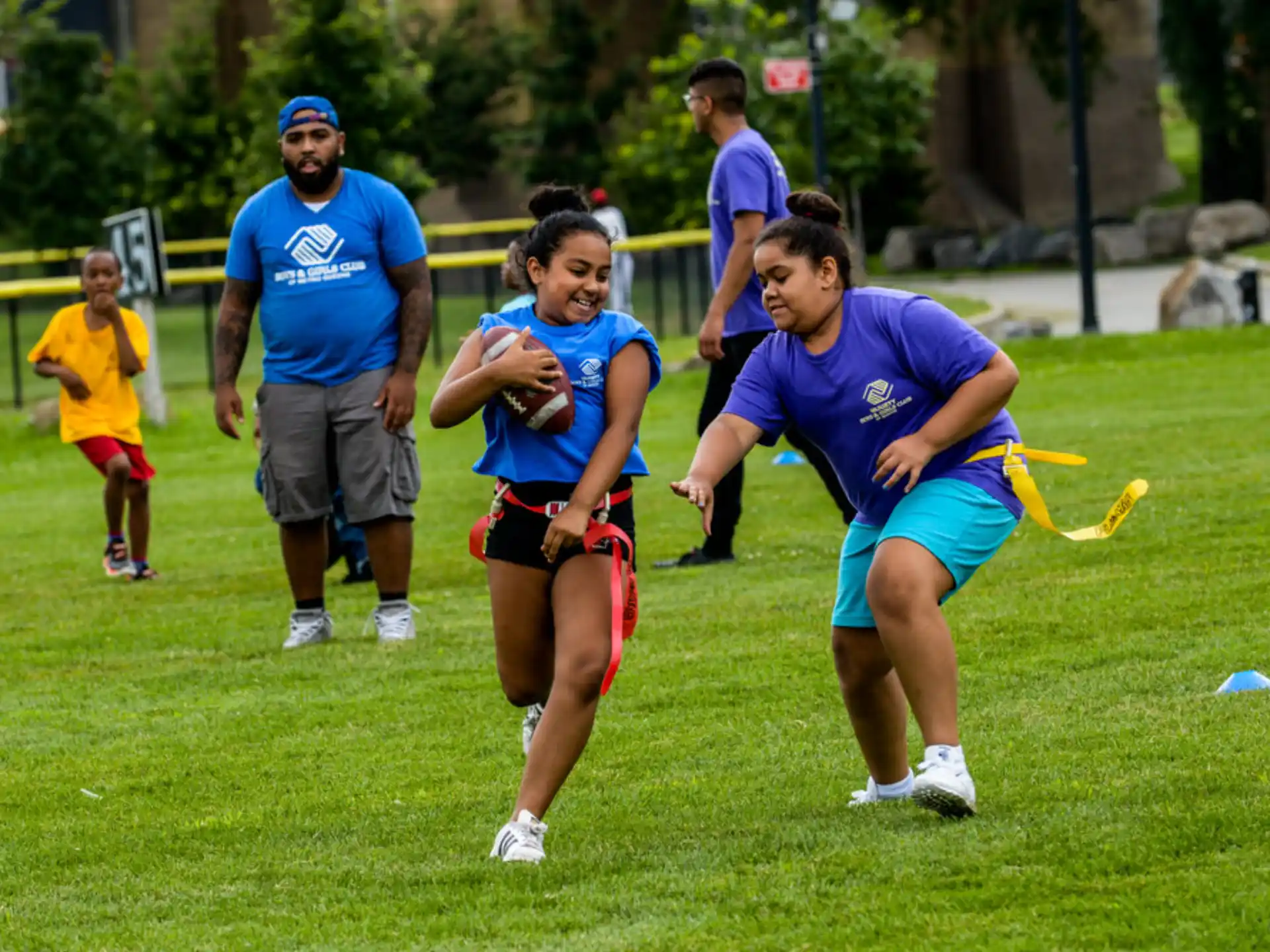 a group of people playing rugby