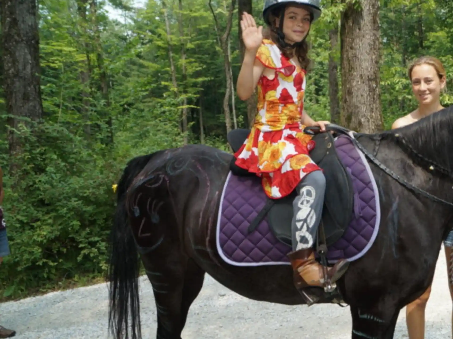 a girl riding a horse