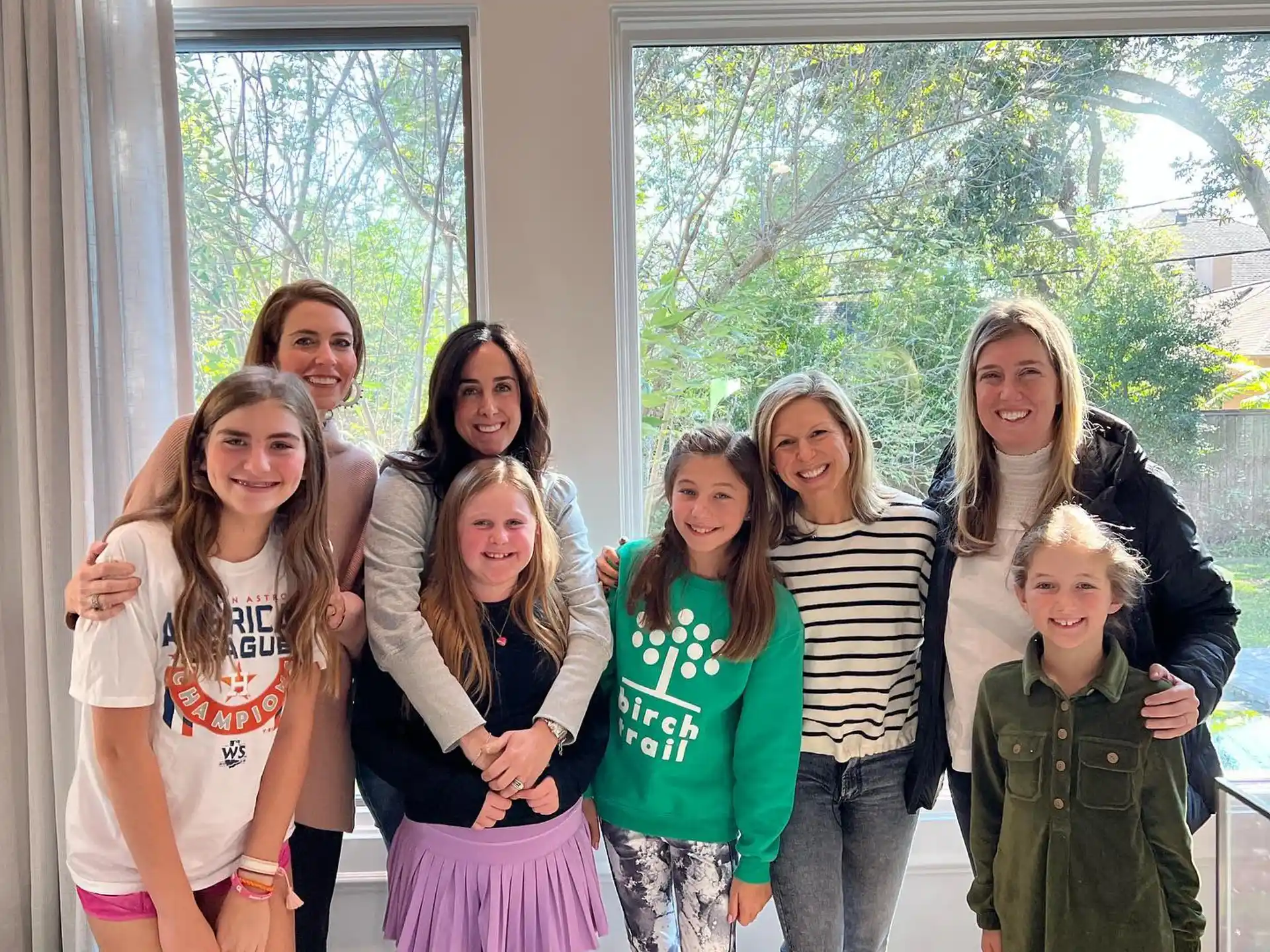 a group of girls posing for a picture