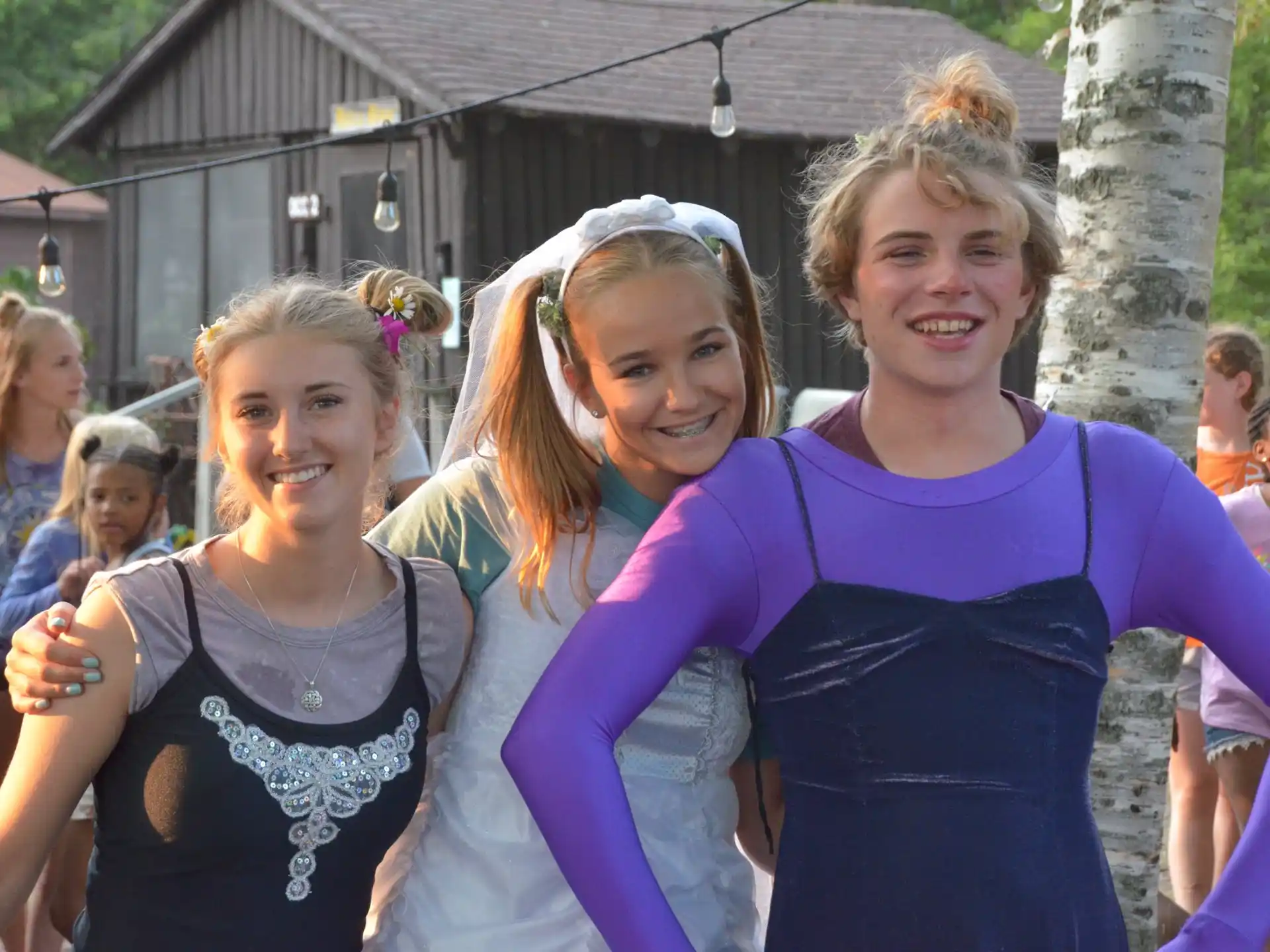 a group of girls posing for a picture
