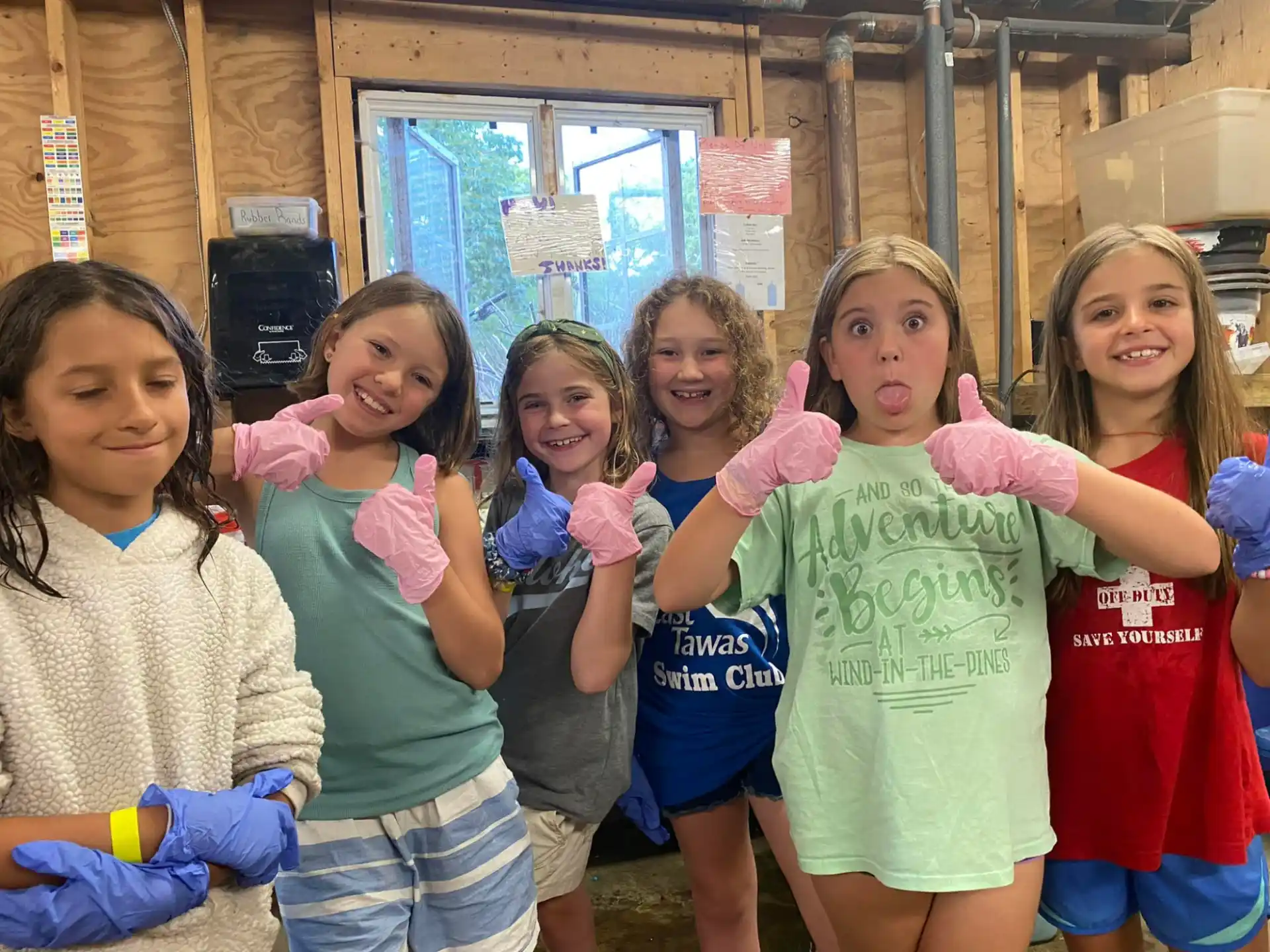 a group of girls posing for a photo