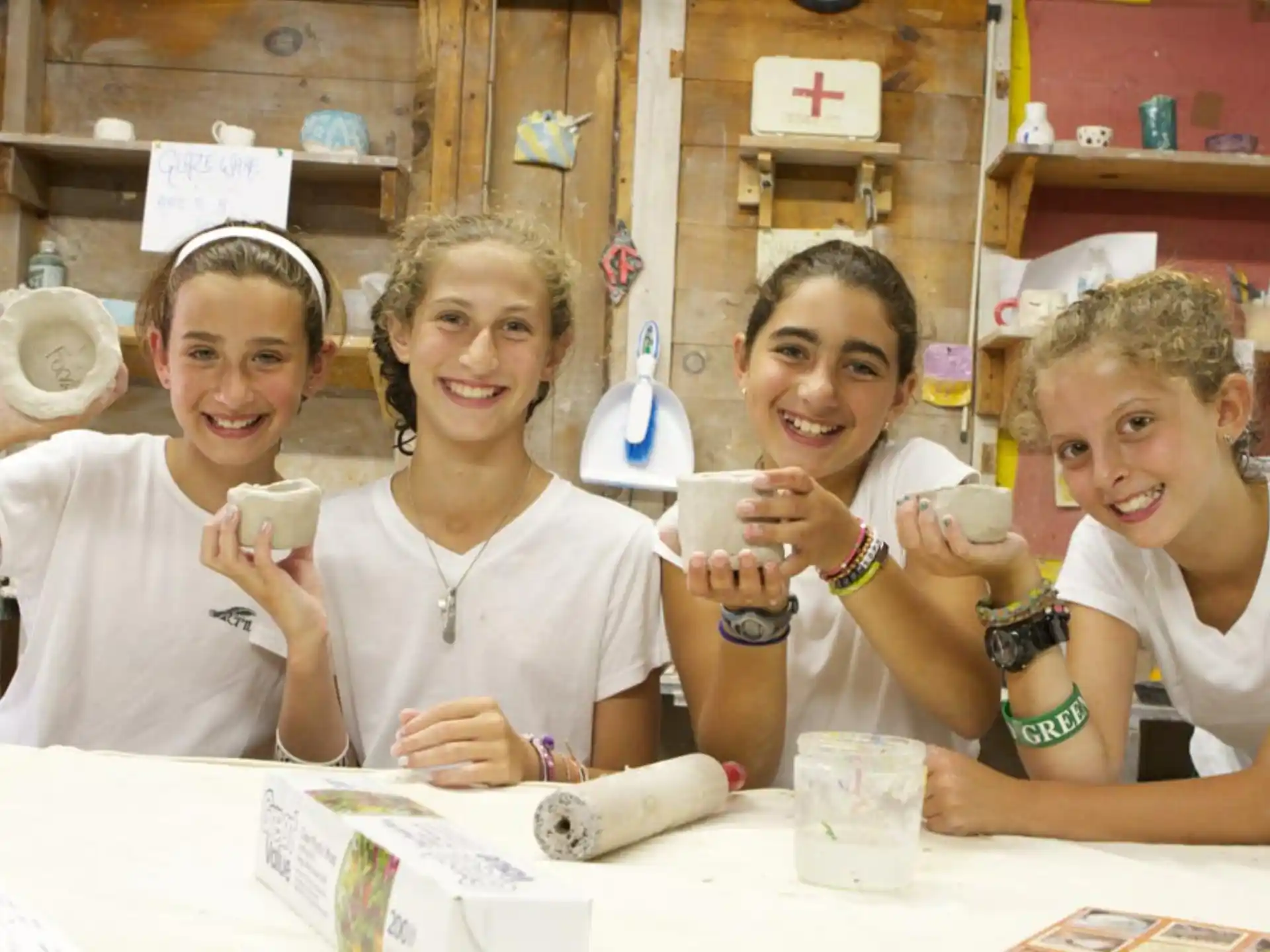 a group of girls holding objects