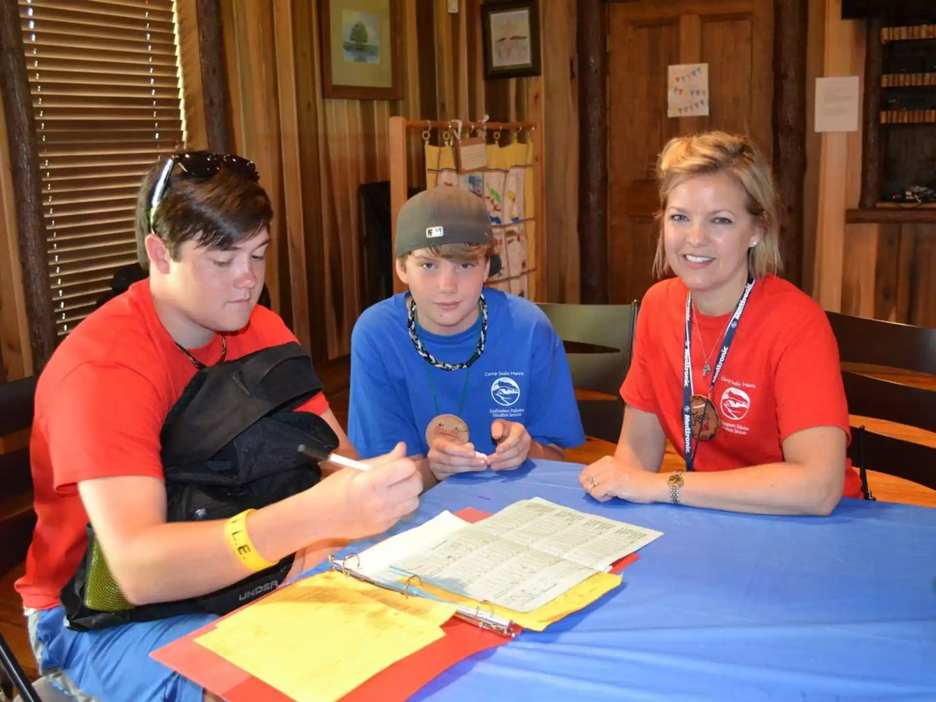 a group of people sitting at a table