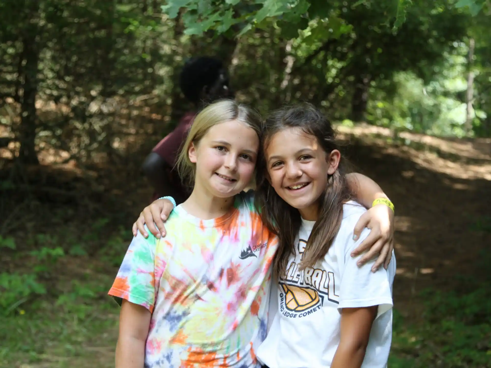 a couple of girls hugging