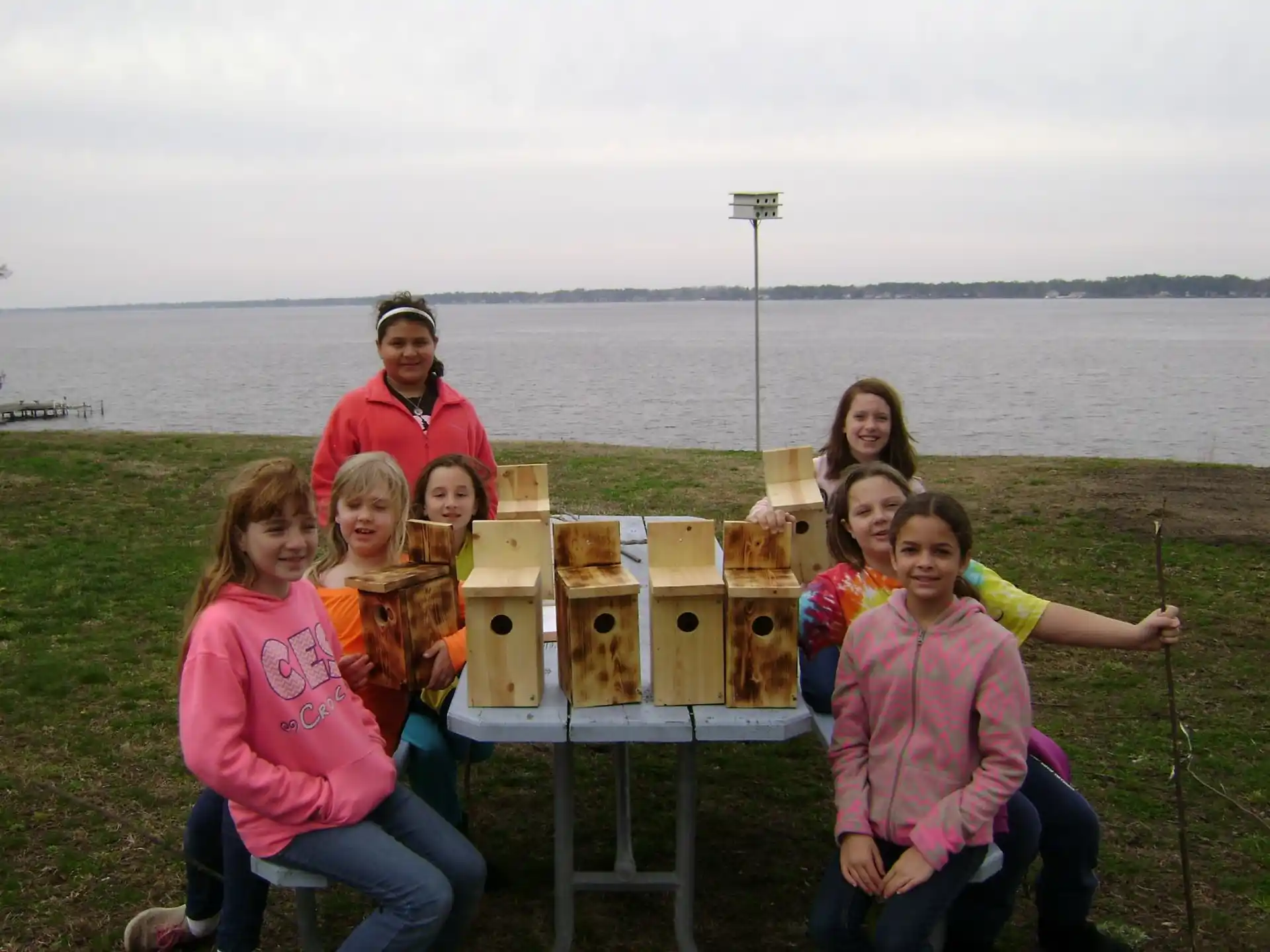 a group of people posing for a photo