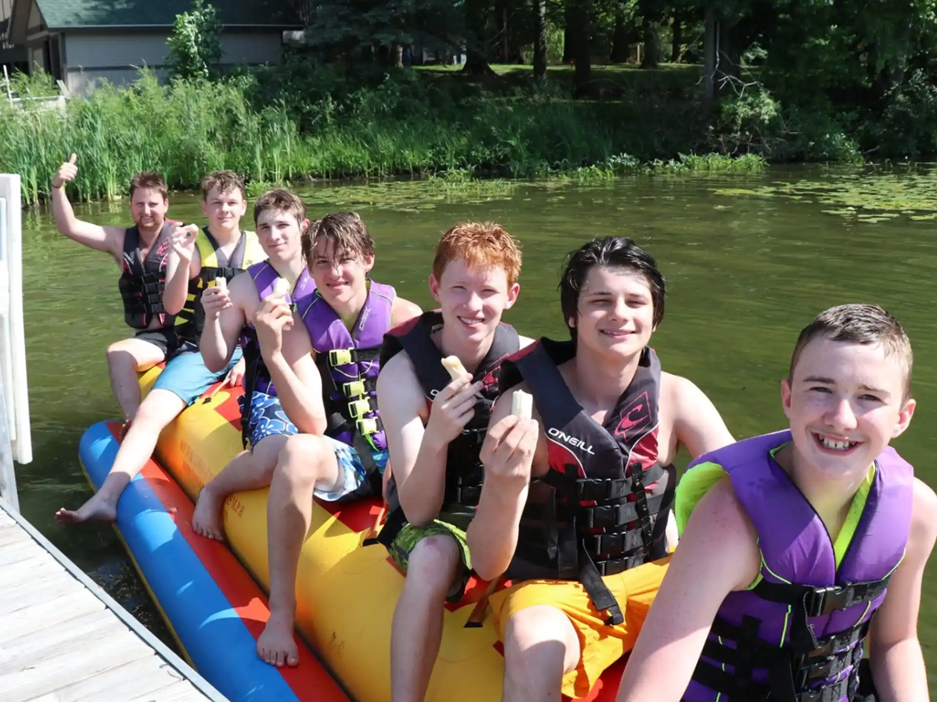 a group of people on a raft