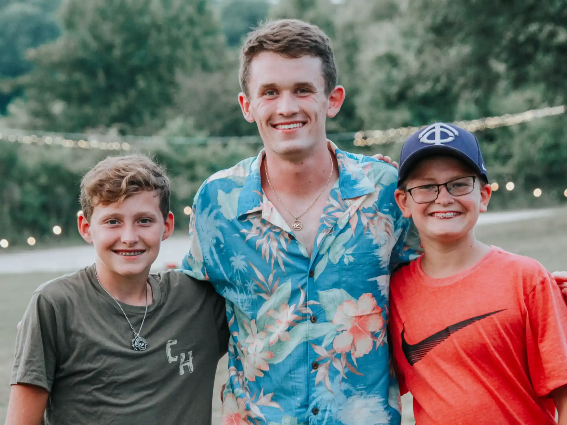 a group of boys posing for a photo