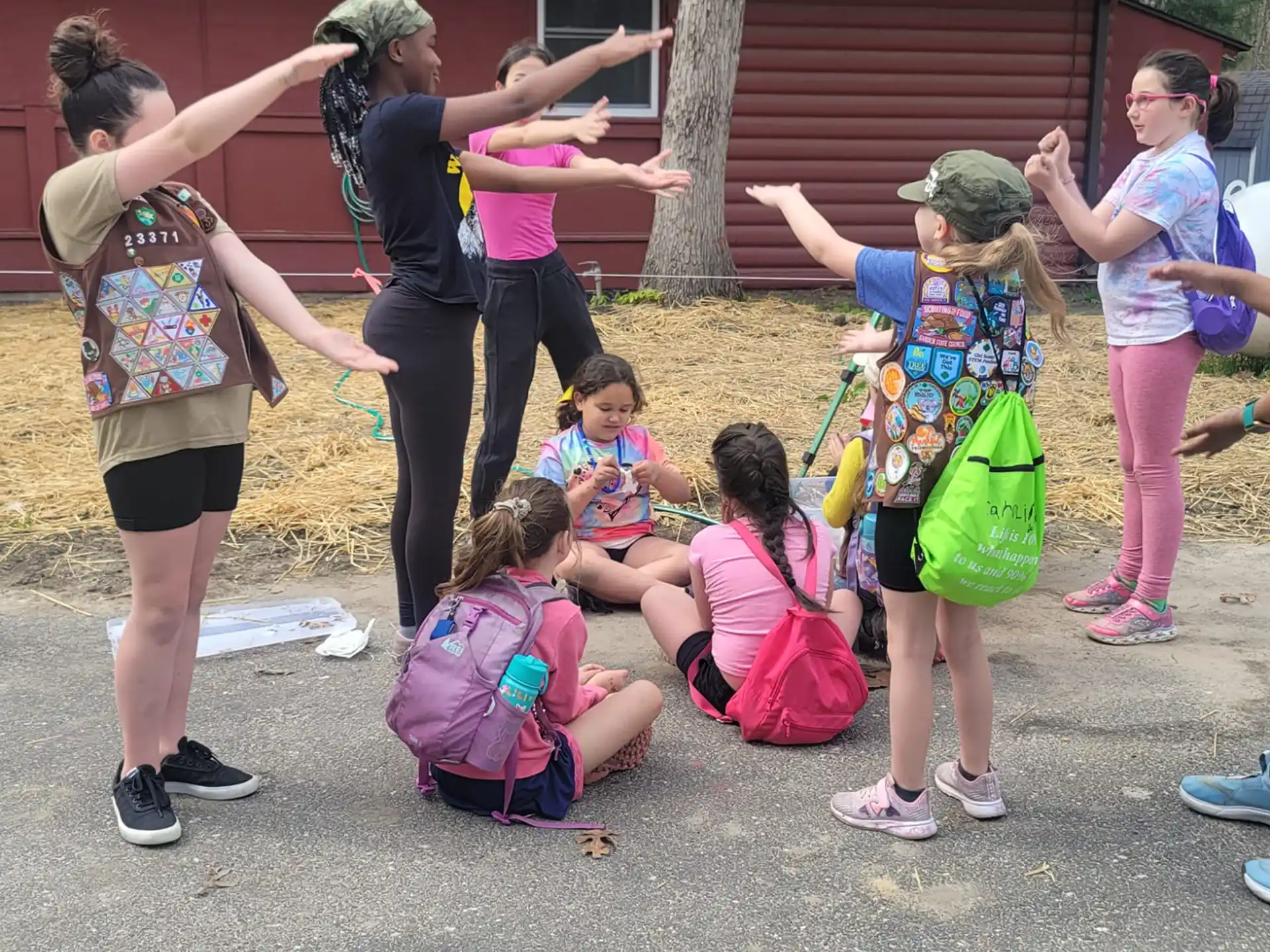 a group of people playing outside