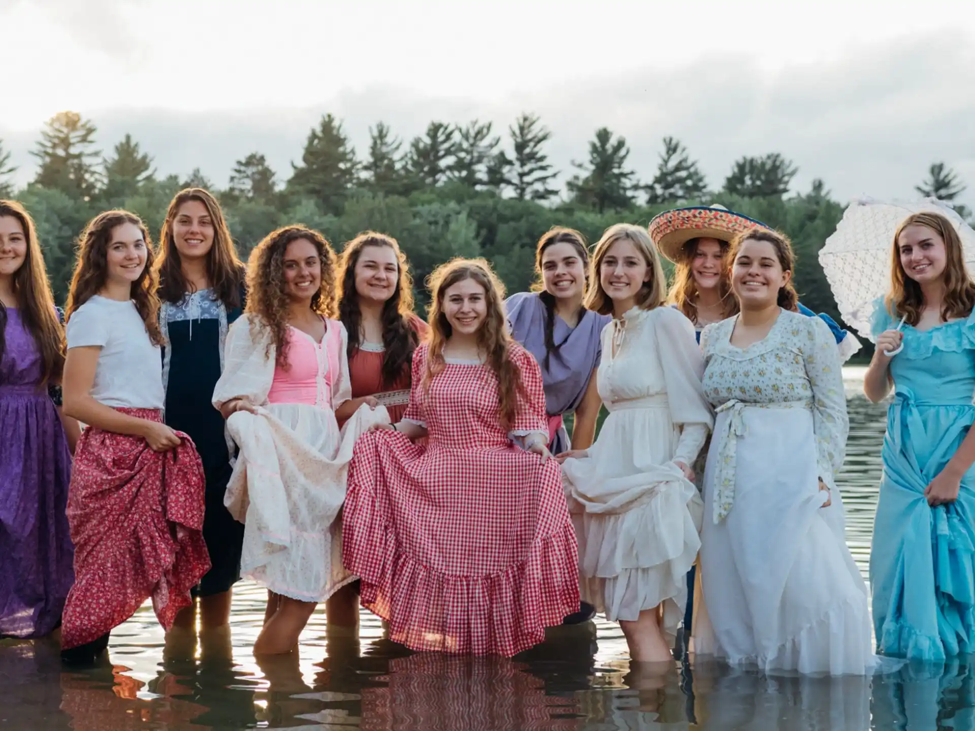 a group of women posing for a photo