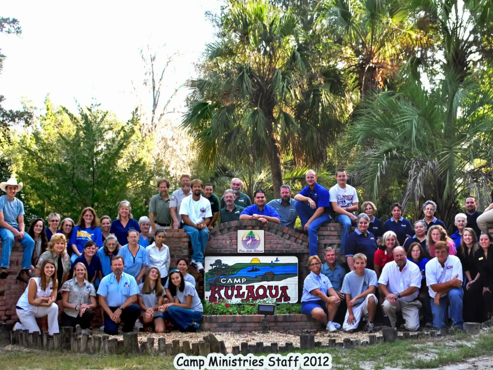 a group of people posing for a photo