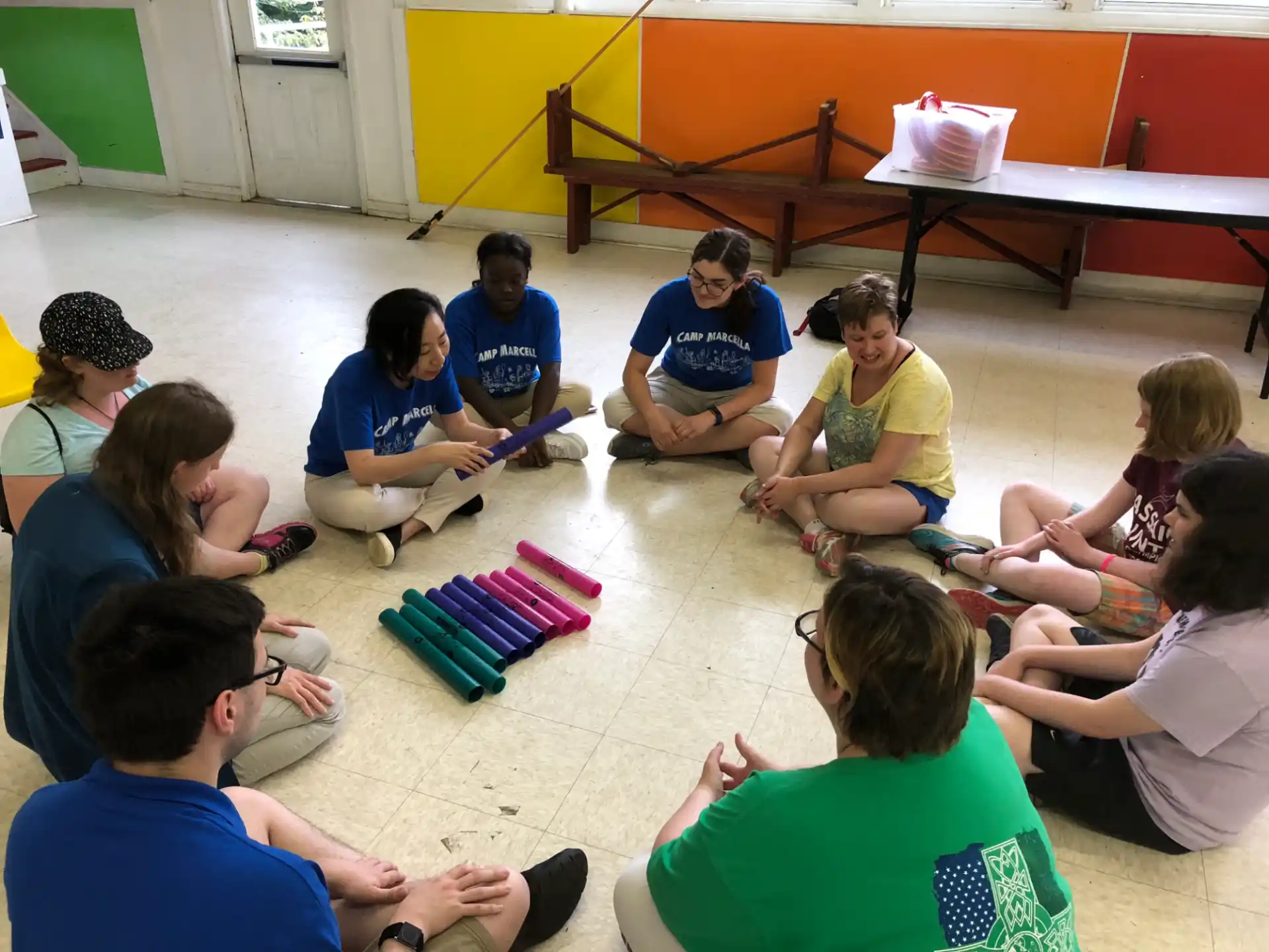 a group of people sitting on the floor