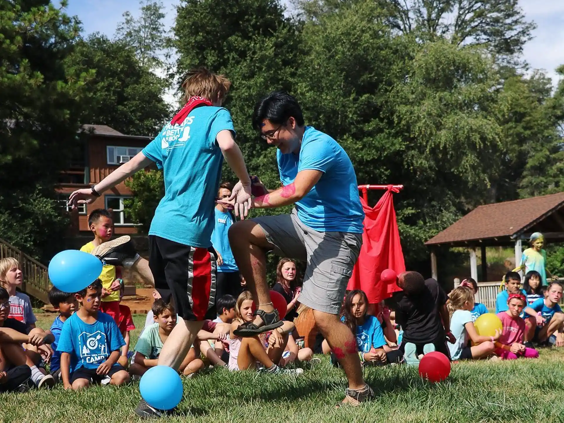 a group of people playing with balls