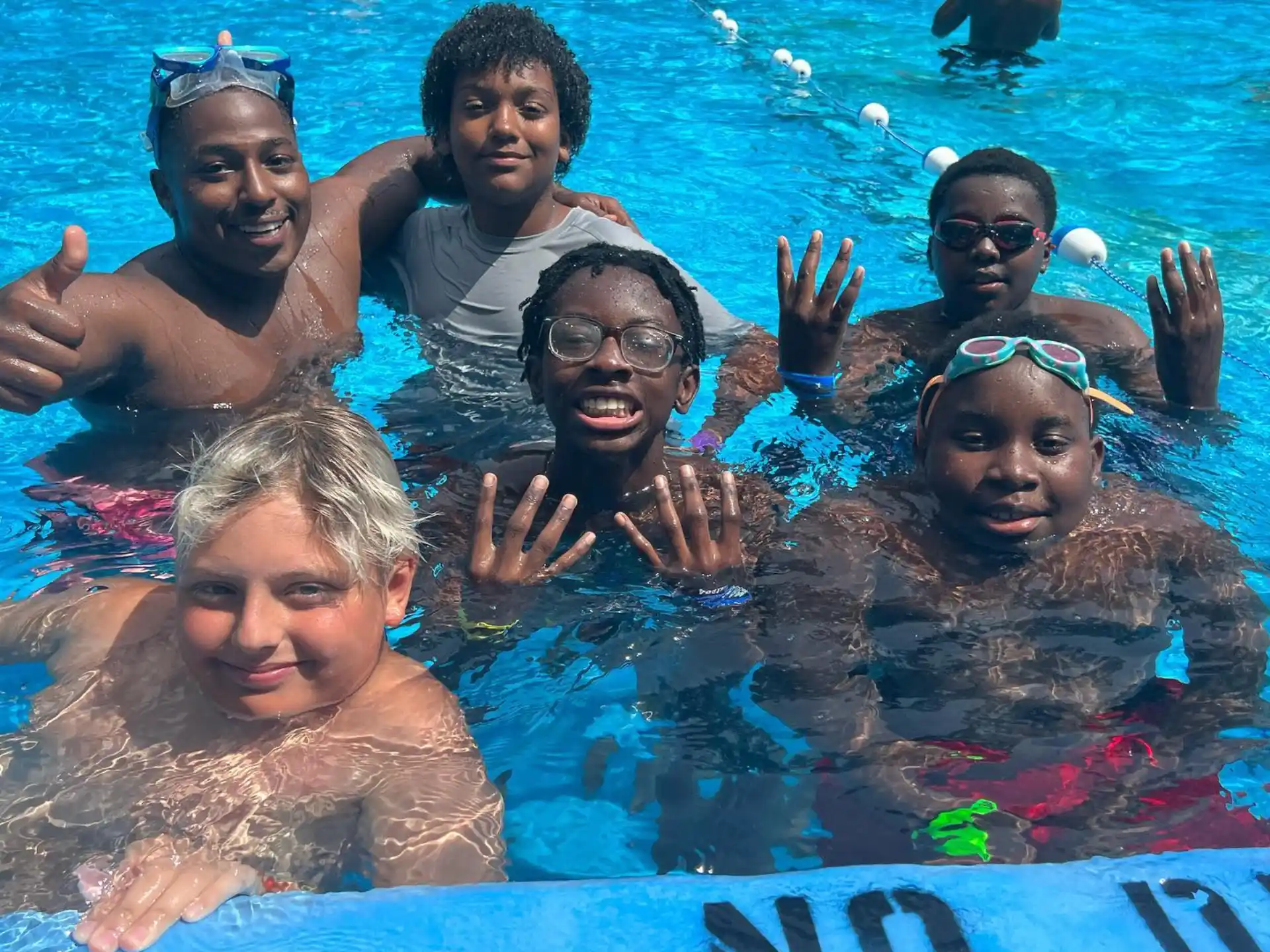 a group of people in a pool