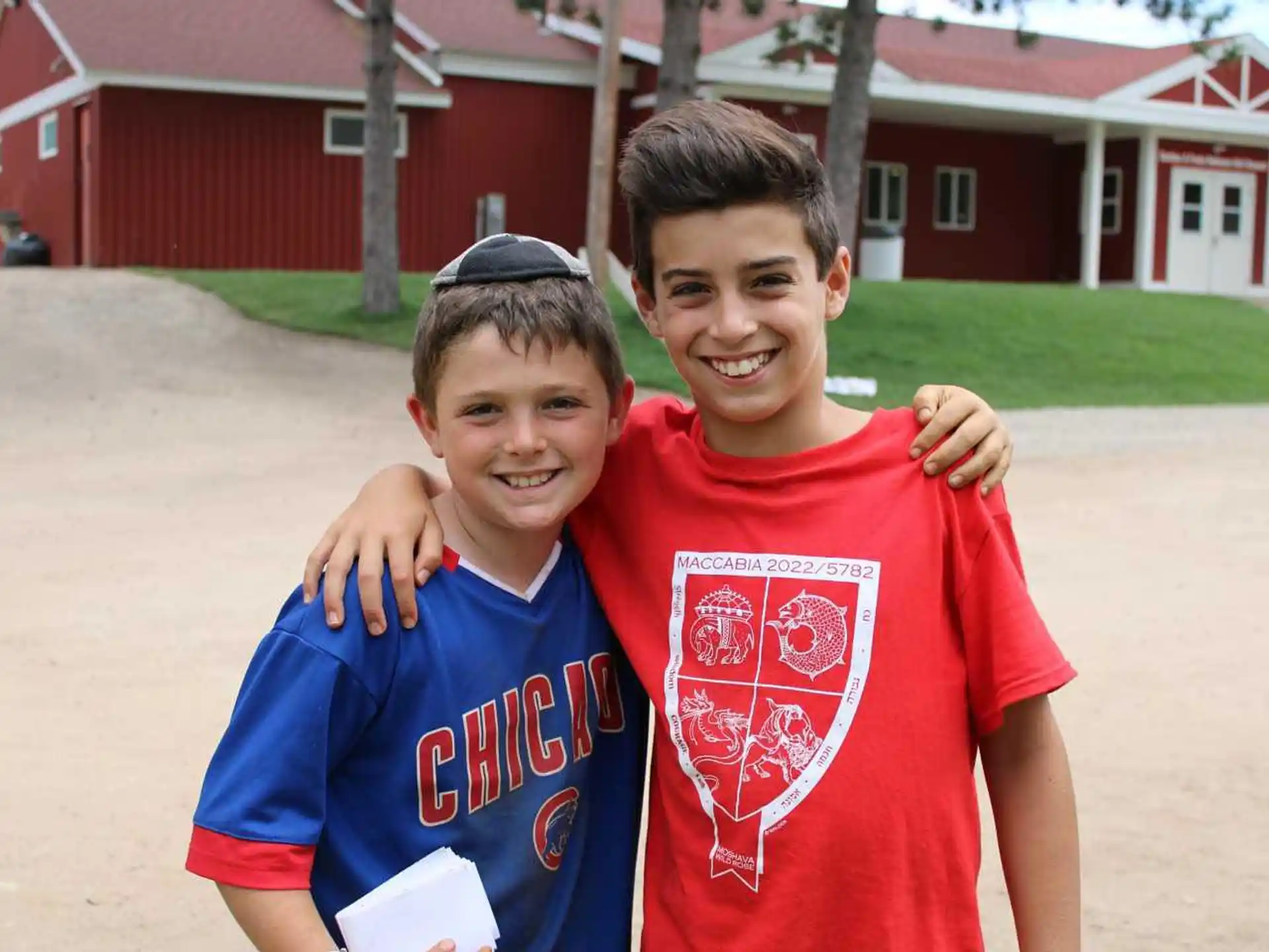 a couple of boys posing for the camera