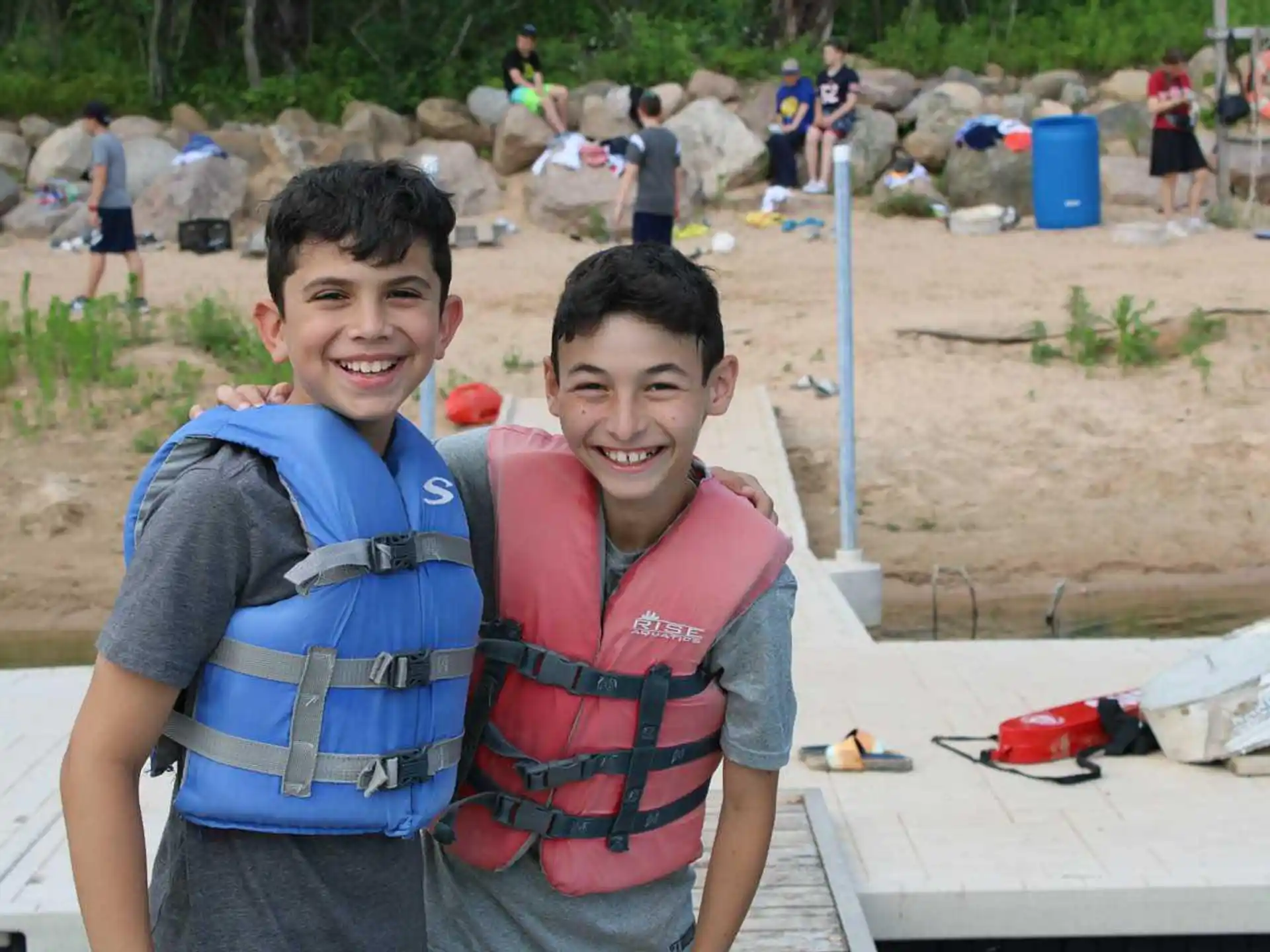 a couple of boys posing for the camera