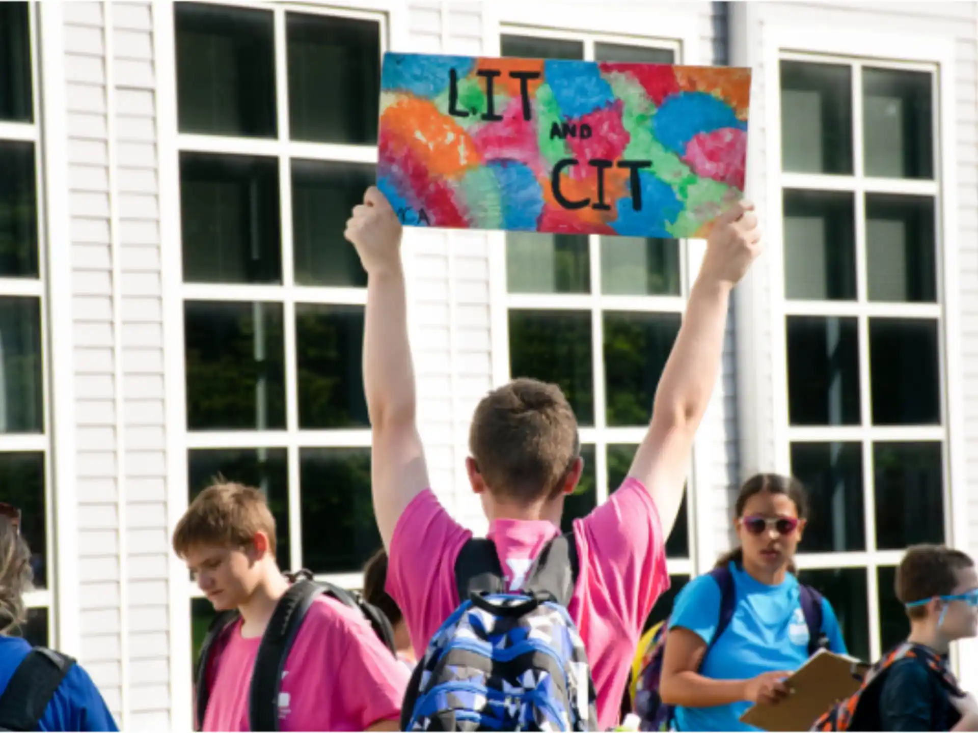 a group of people holding up a flag