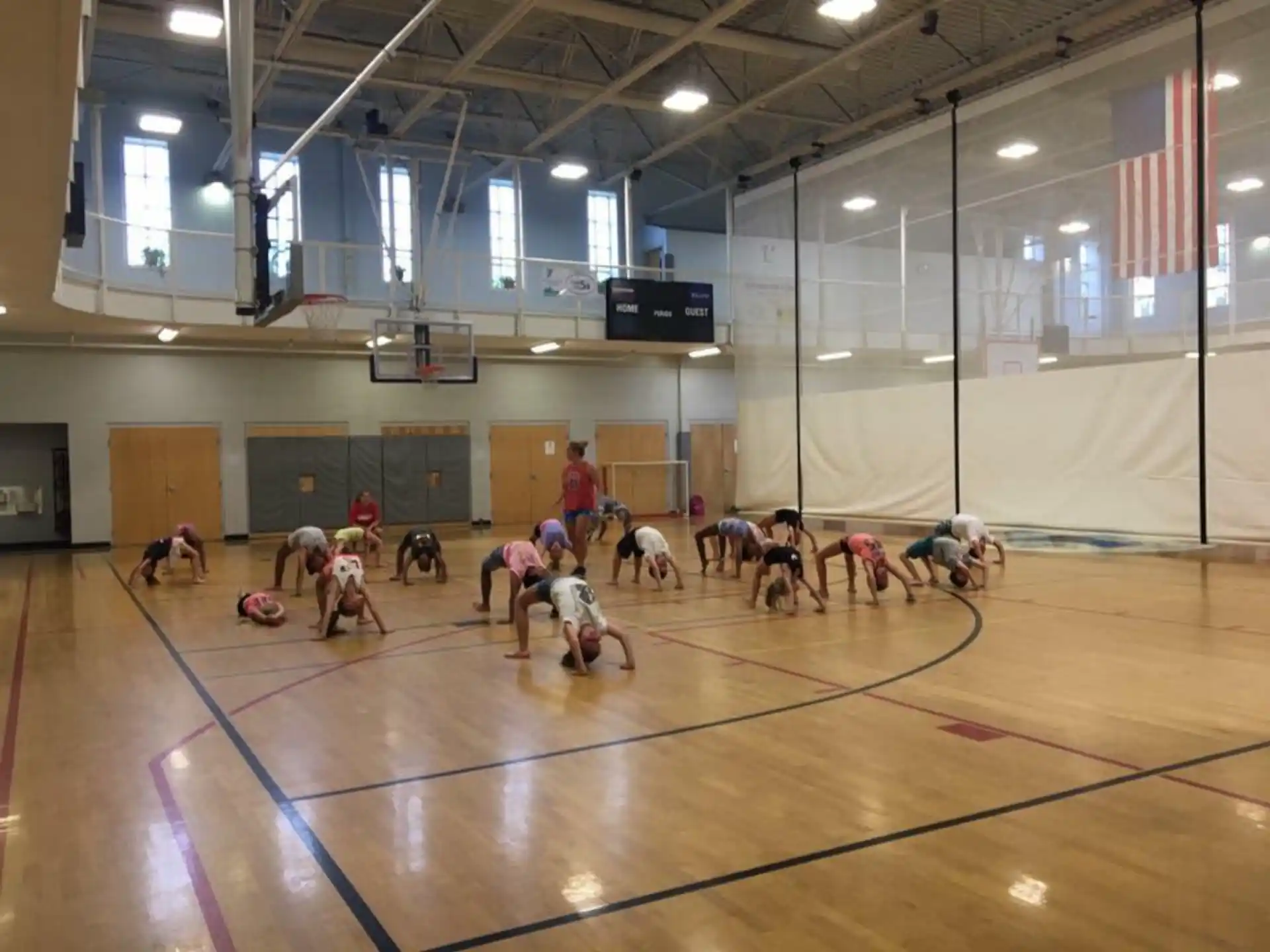 a group of people in a gym