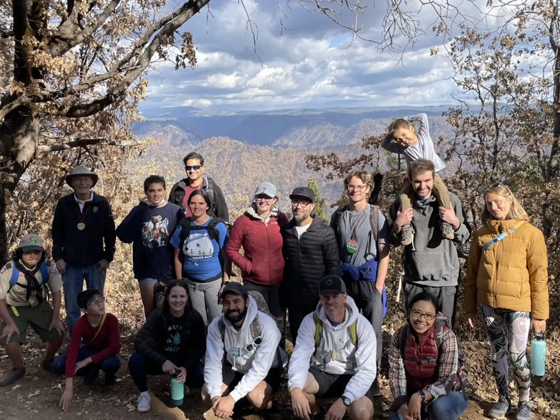 a group of people posing for a photo