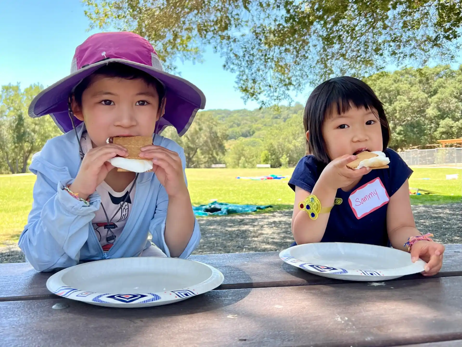 two kids eating food