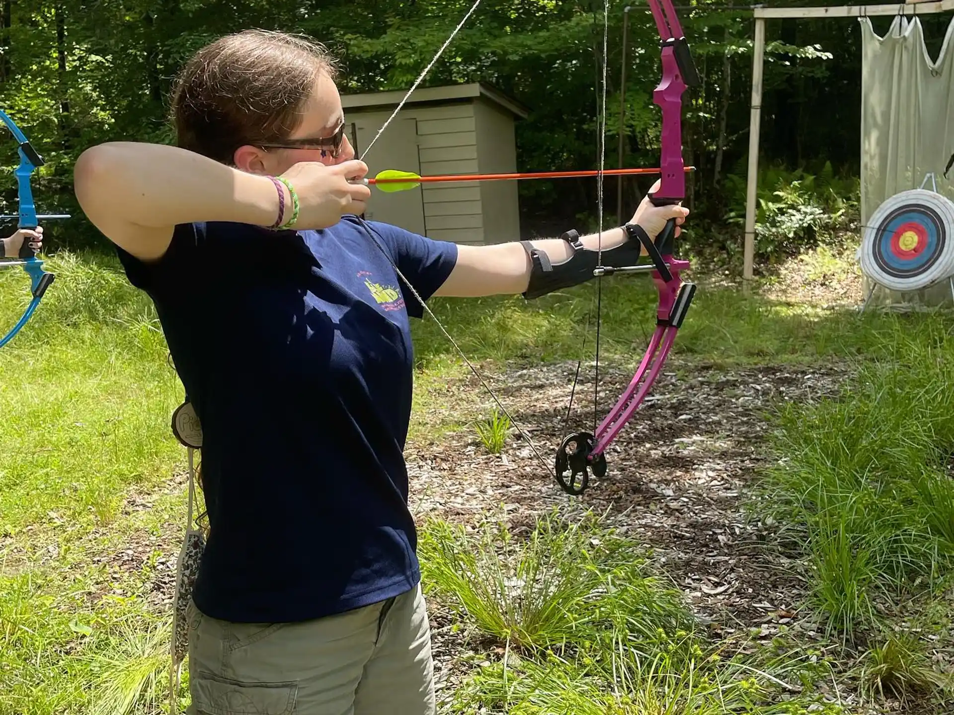 a man holding a bow and arrow