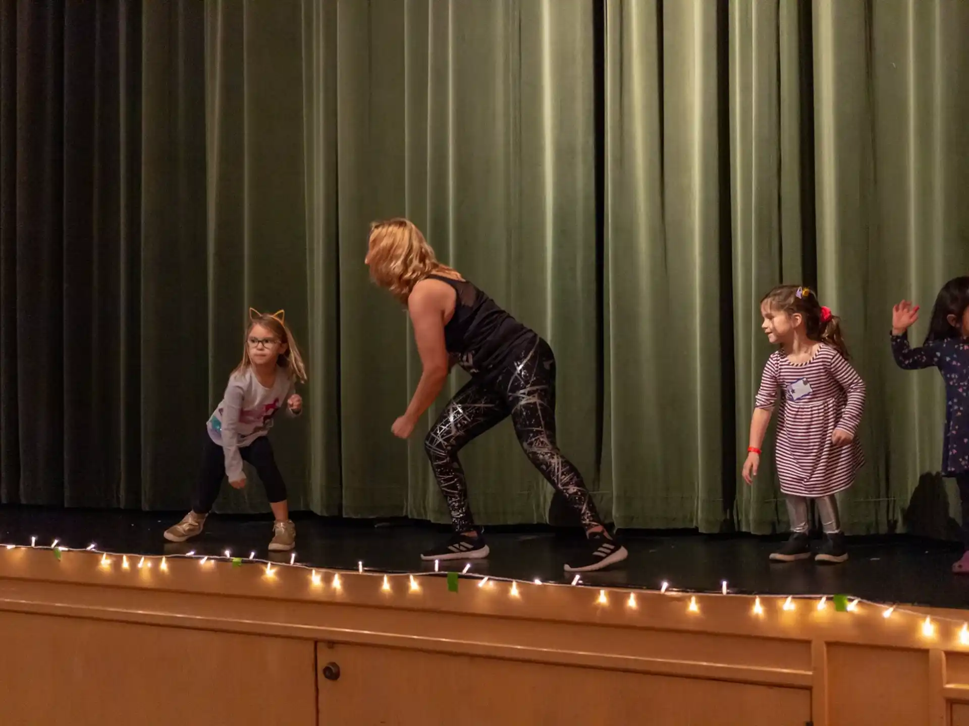 a group of children on a stage