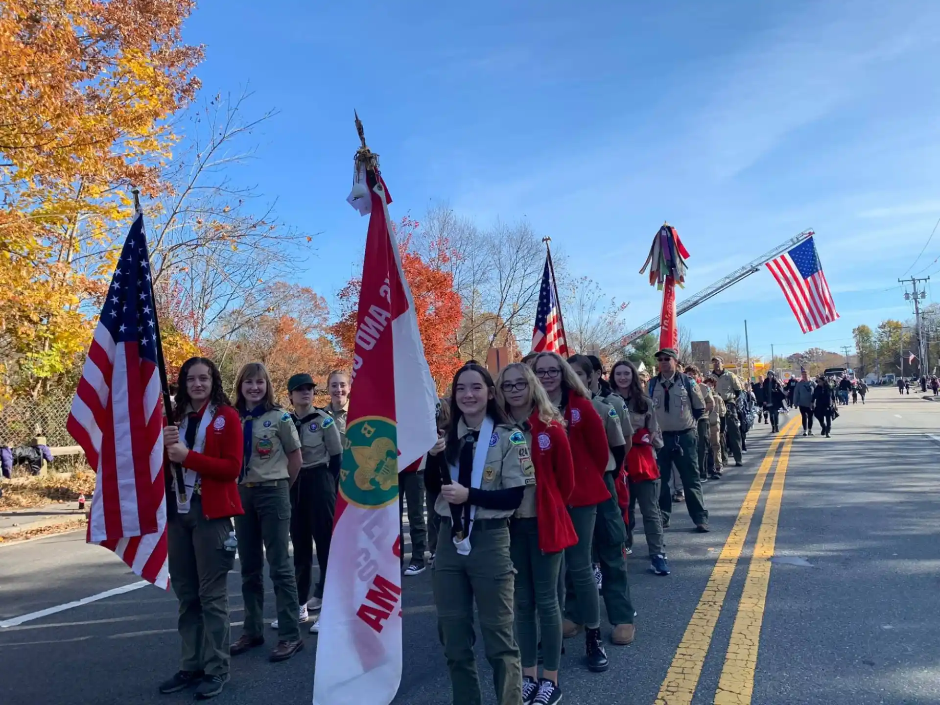 a group of people holding flags