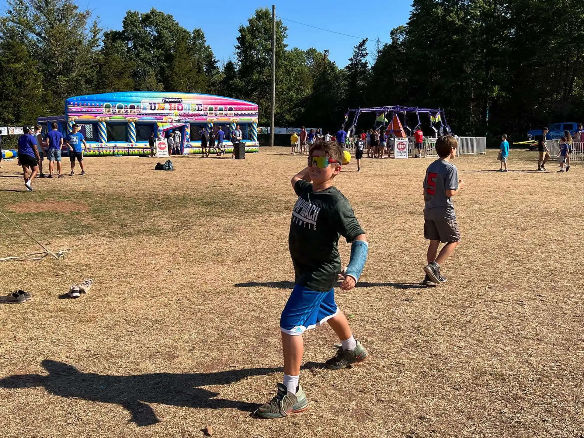 a group of people playing baseball