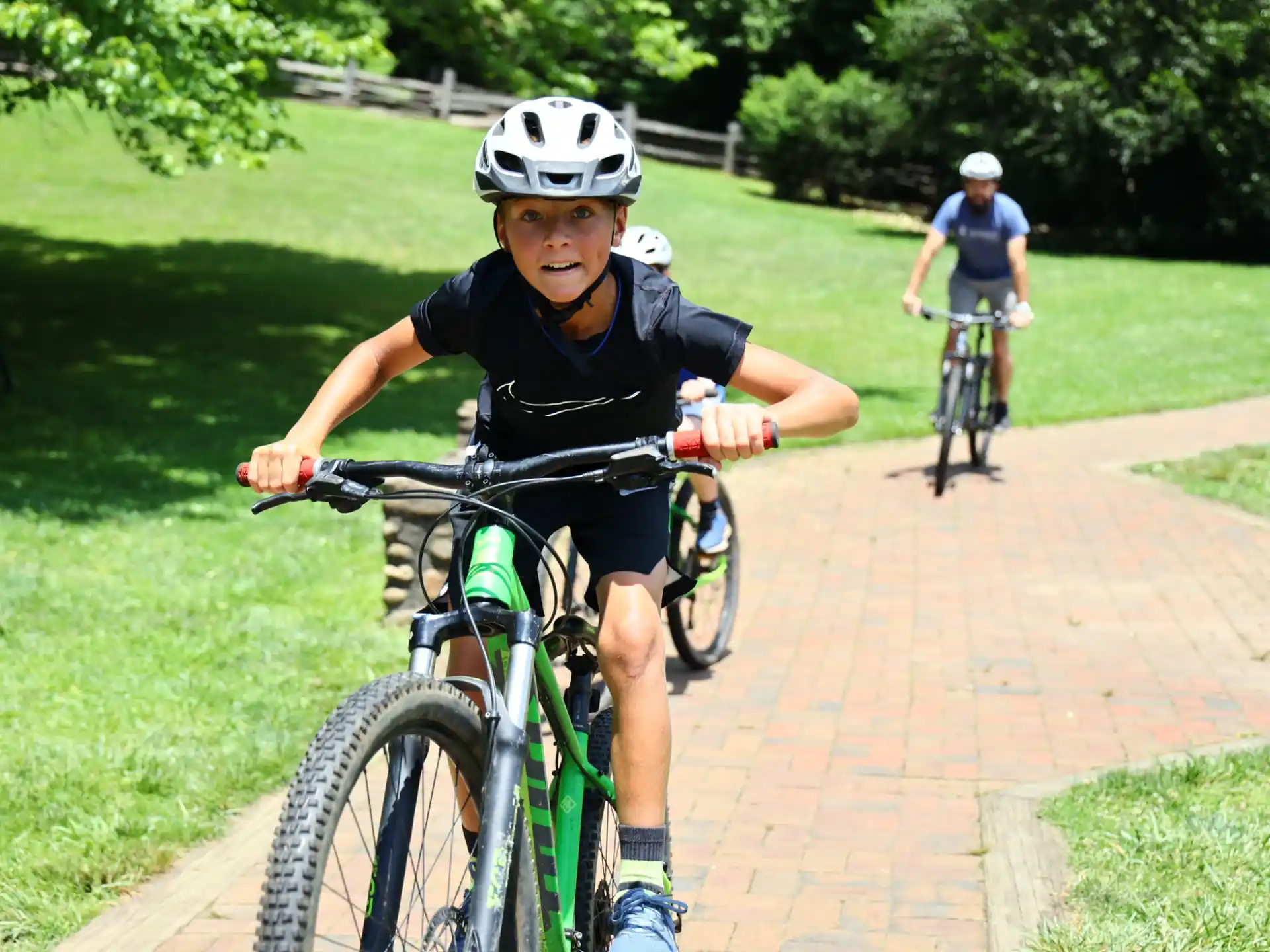 a boy riding a bike
