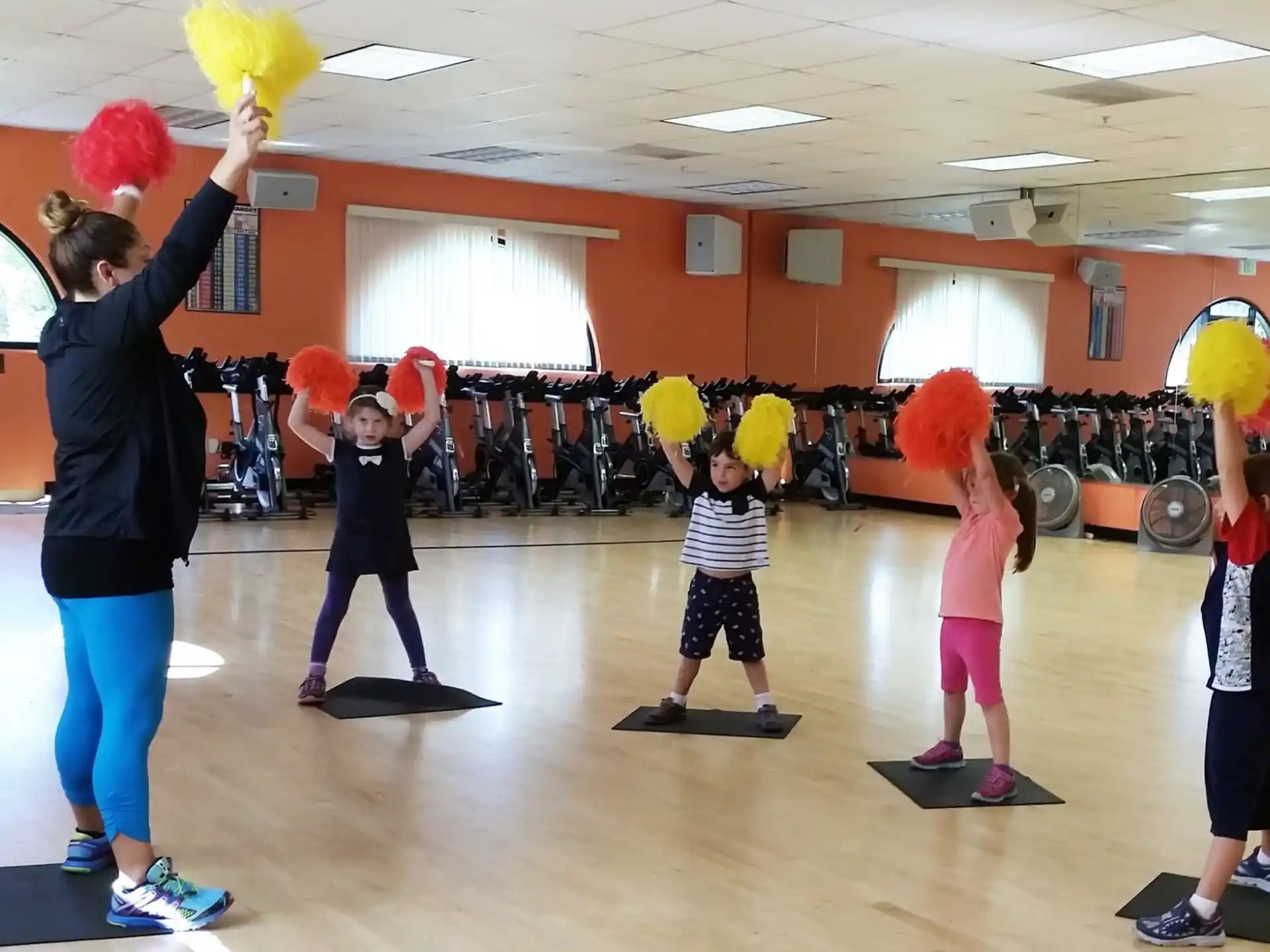 a group of kids holding balloons
