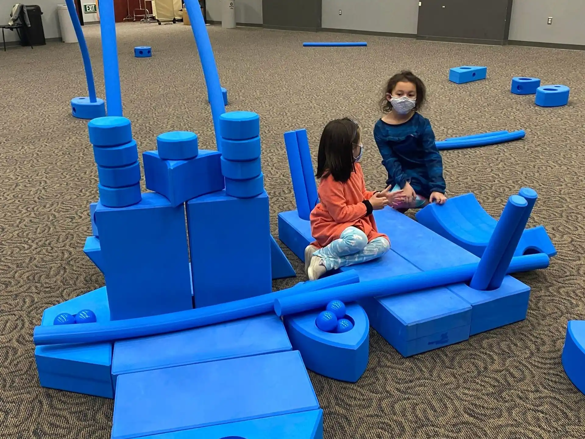 children playing in a sandbox