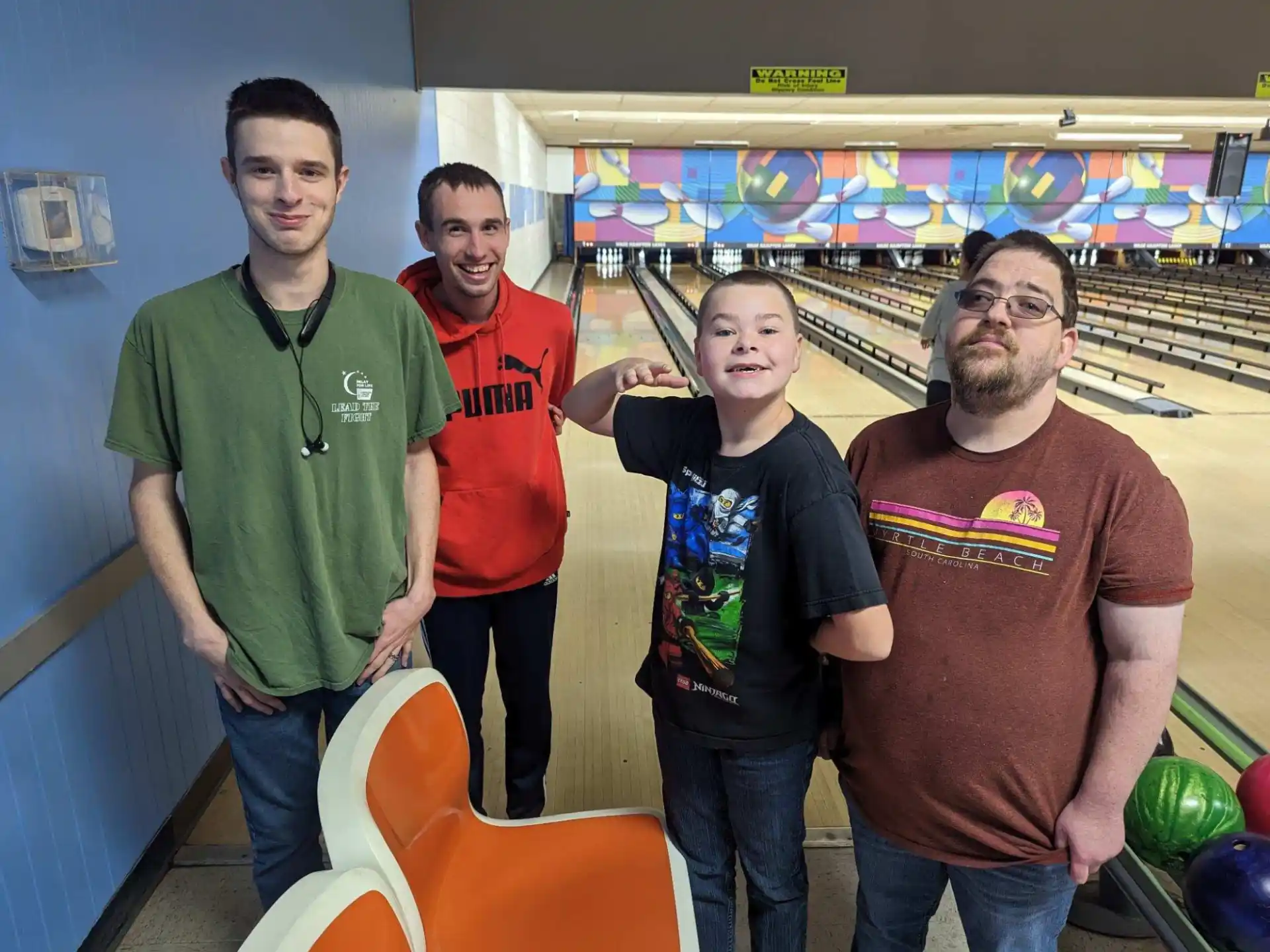 a group of people posing for a photo