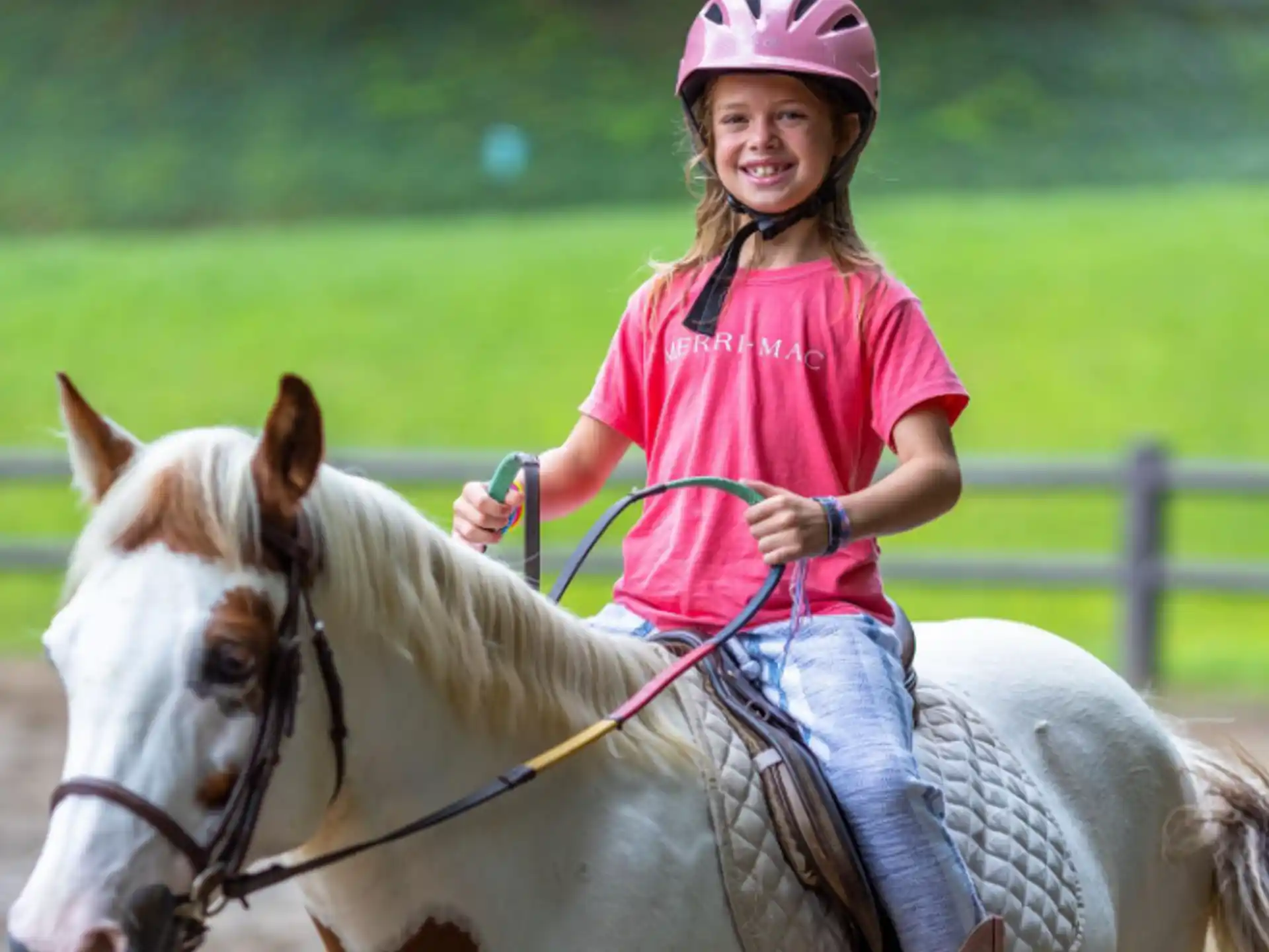 a girl riding a horse