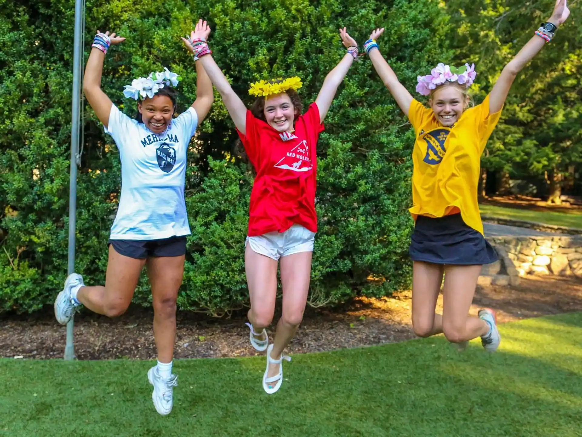 a group of women jumping in the air