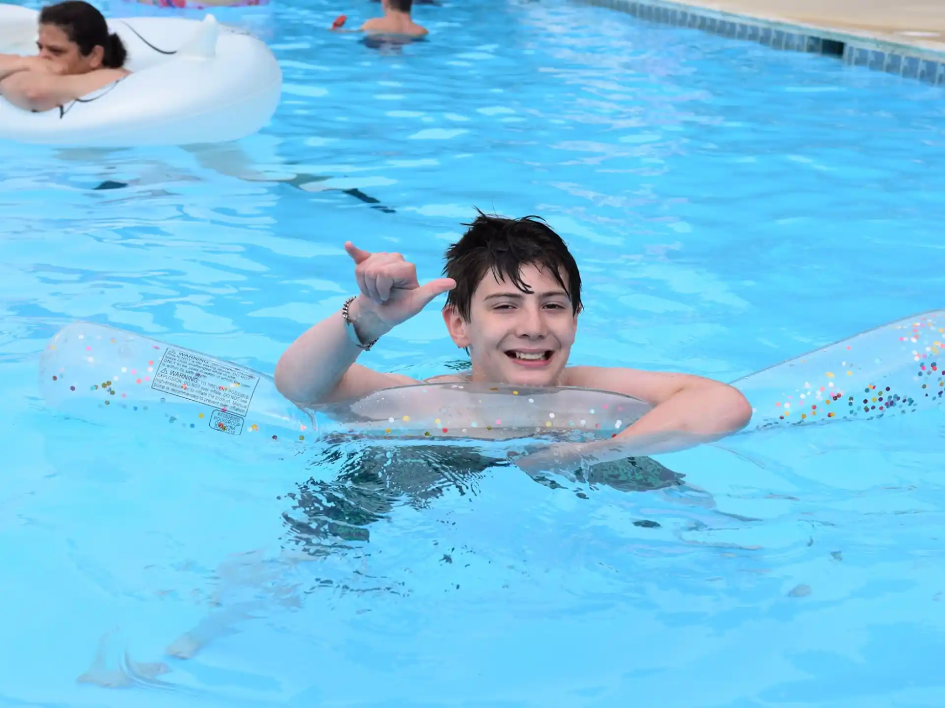 a boy in a pool