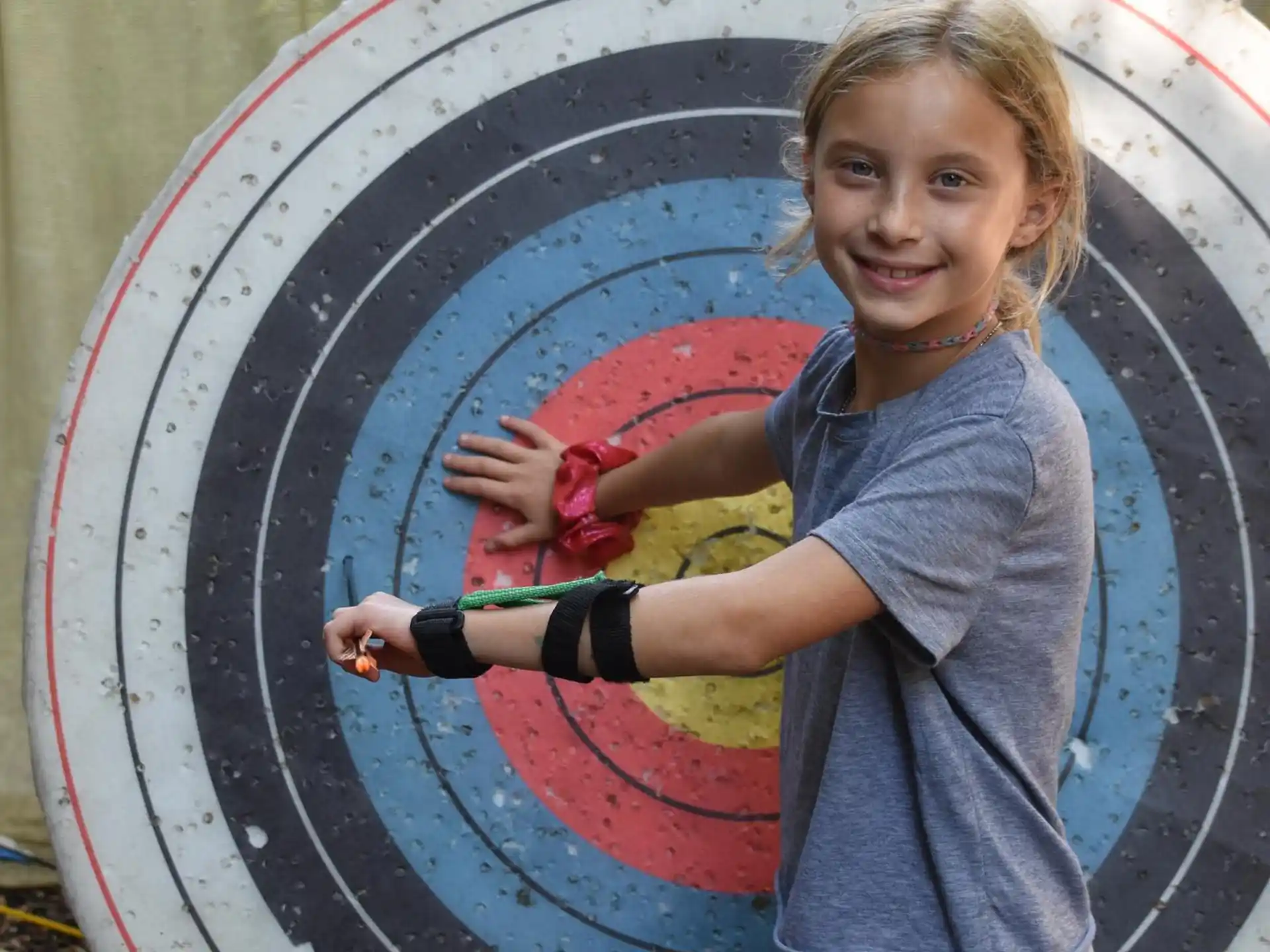 a girl holding a hose
