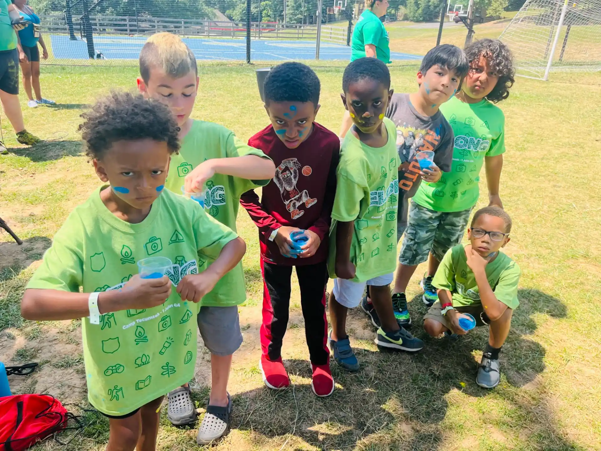 a group of kids posing for a picture