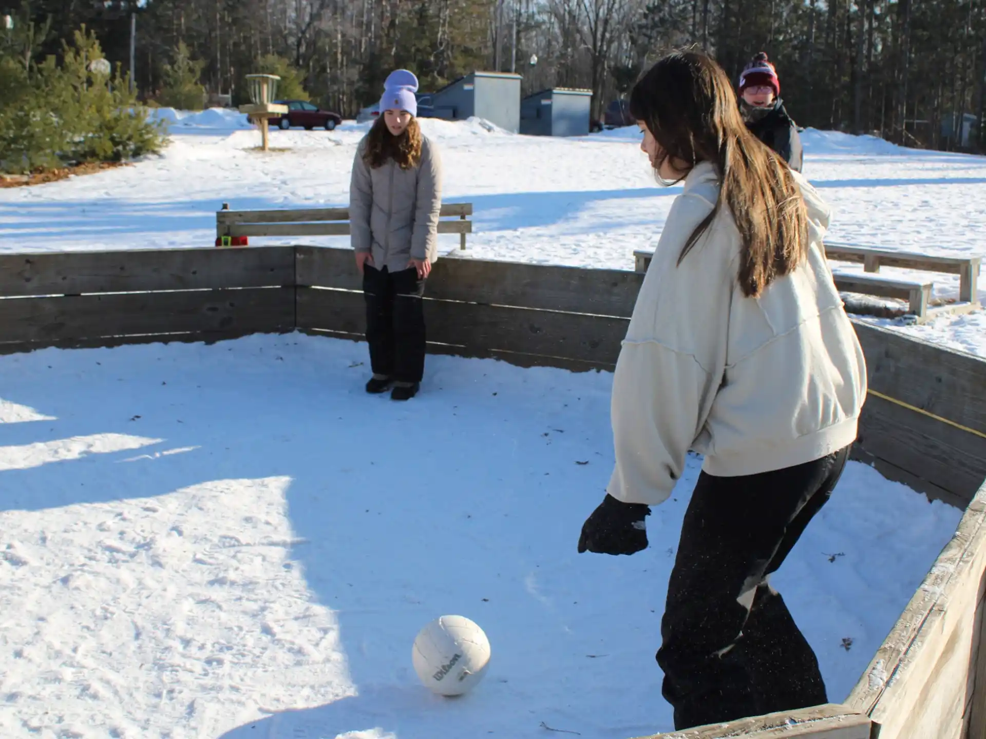 a group of people playing football