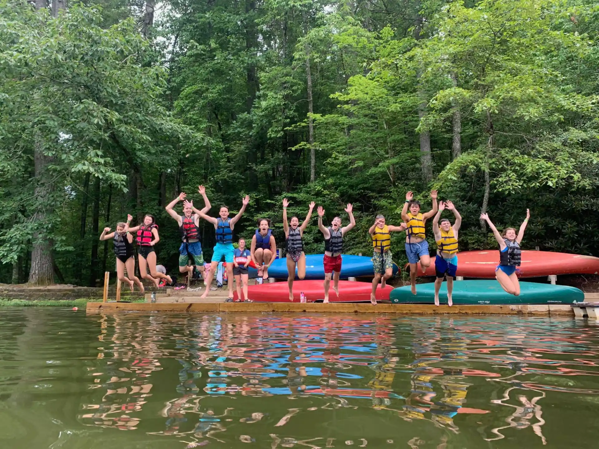 a group of people on a raft