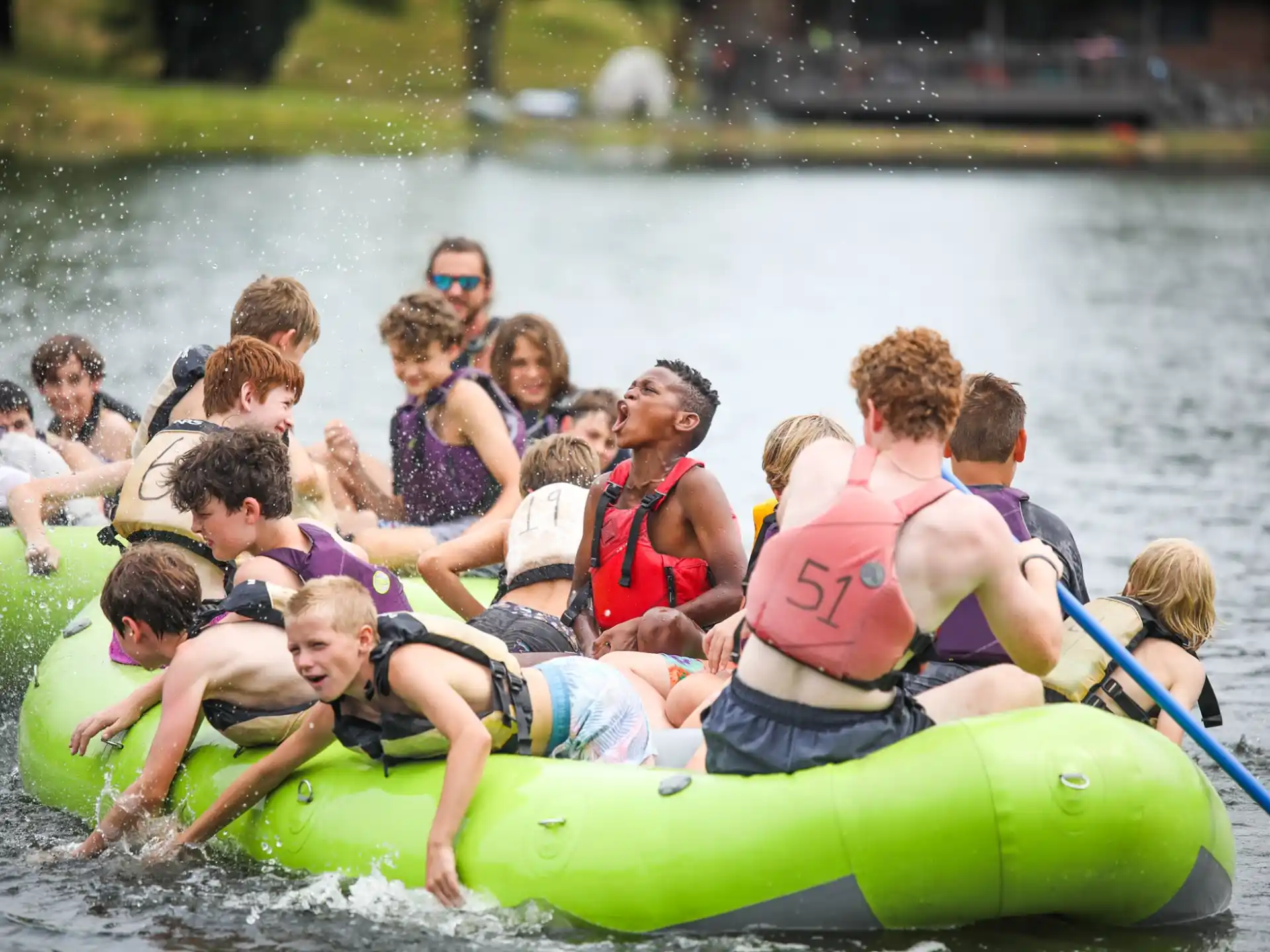 a group of people in a raft